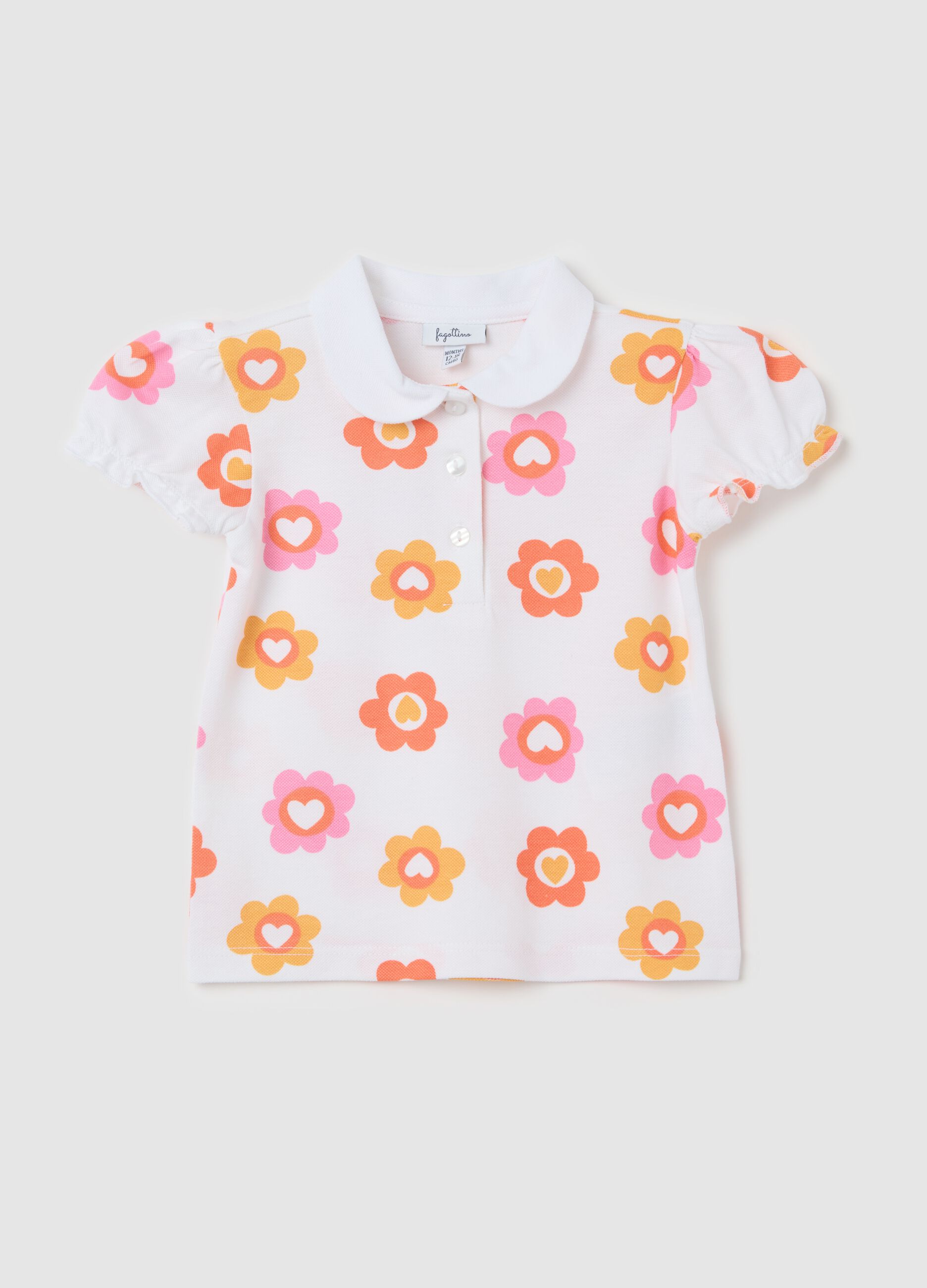 White polo shirt in organic cotton with flowers print
