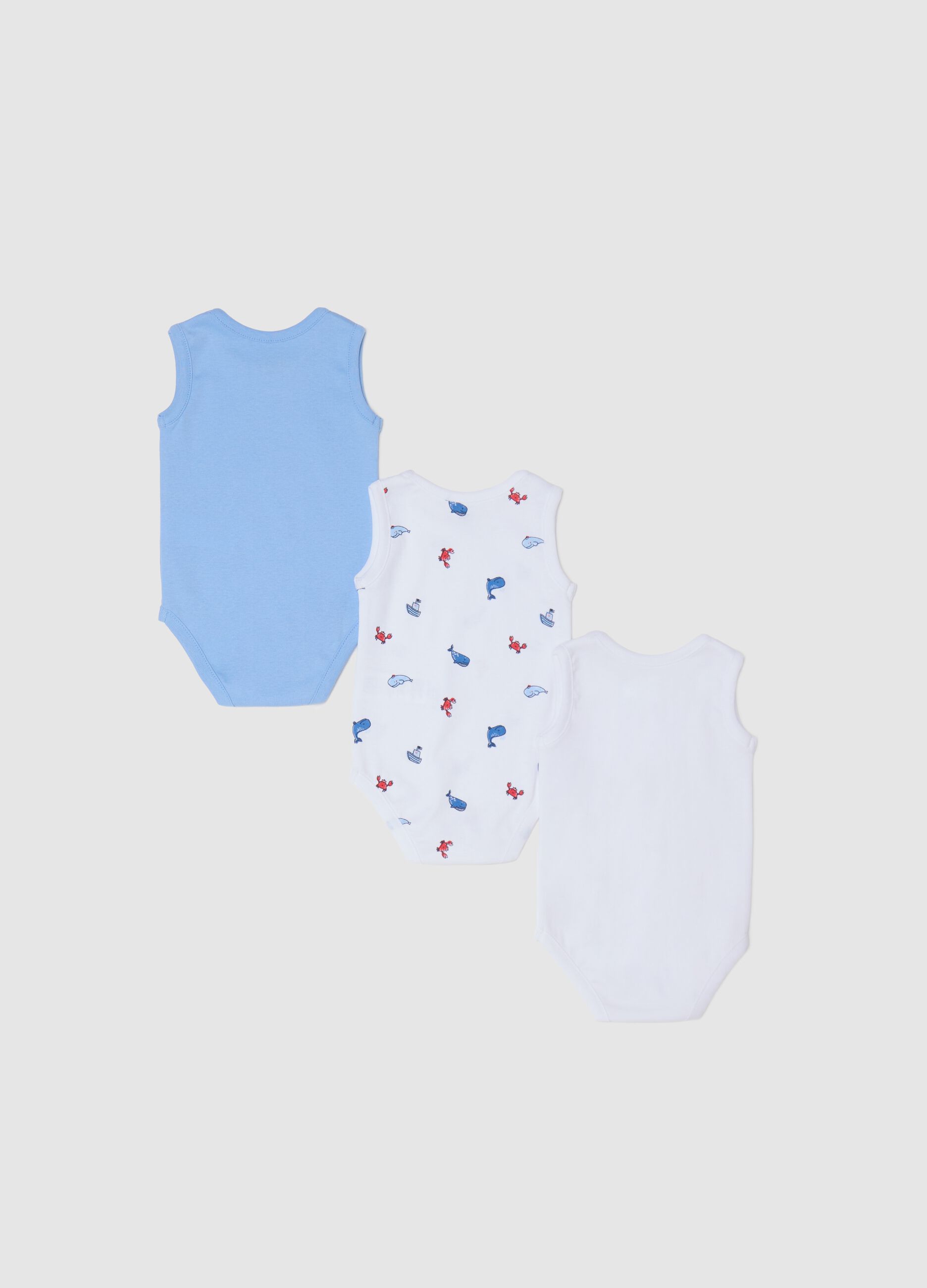Three-pack white and light blue bodysuits in organic cotton with print