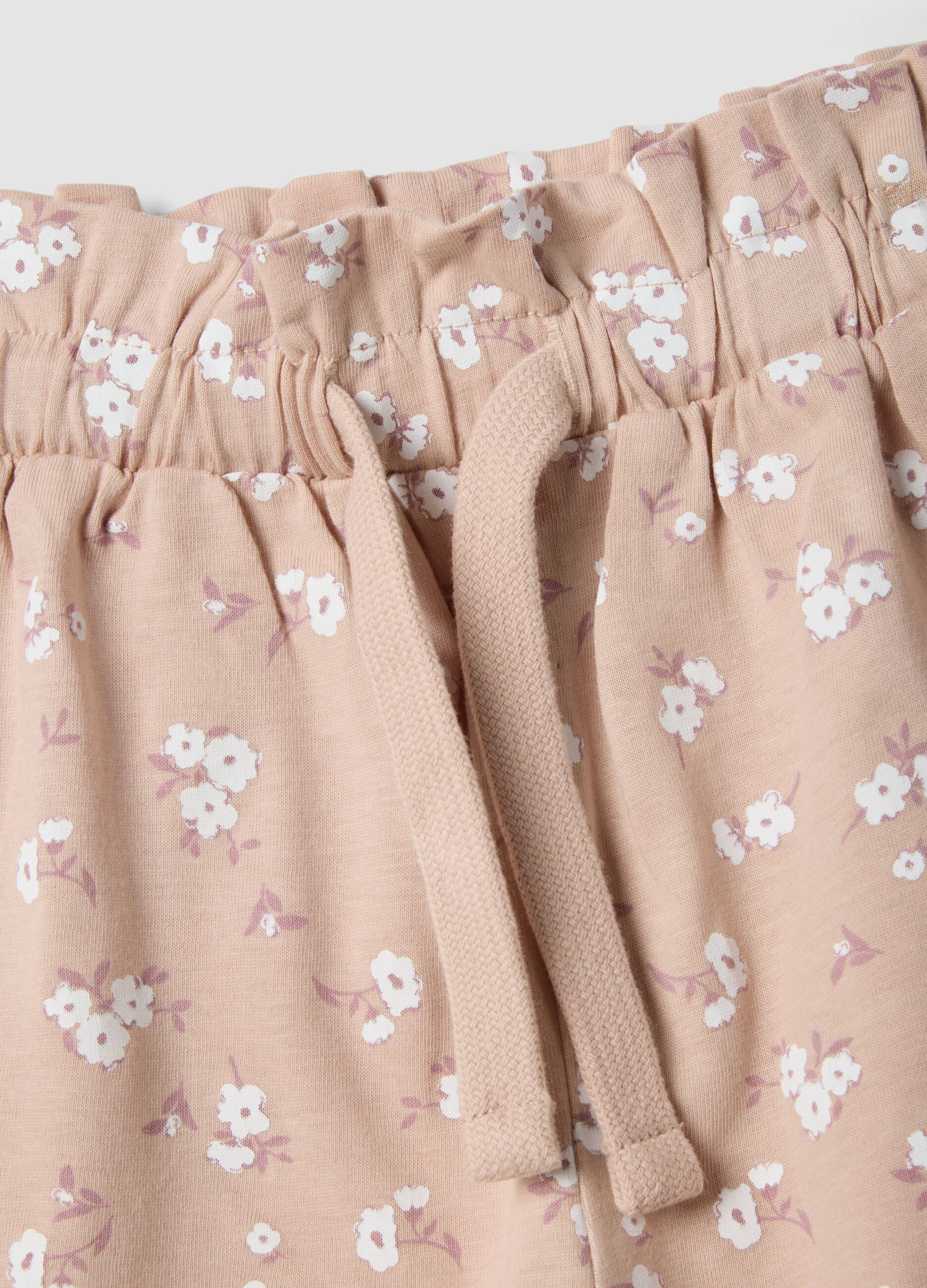 Girls' beige pure cotton shorts with floral print