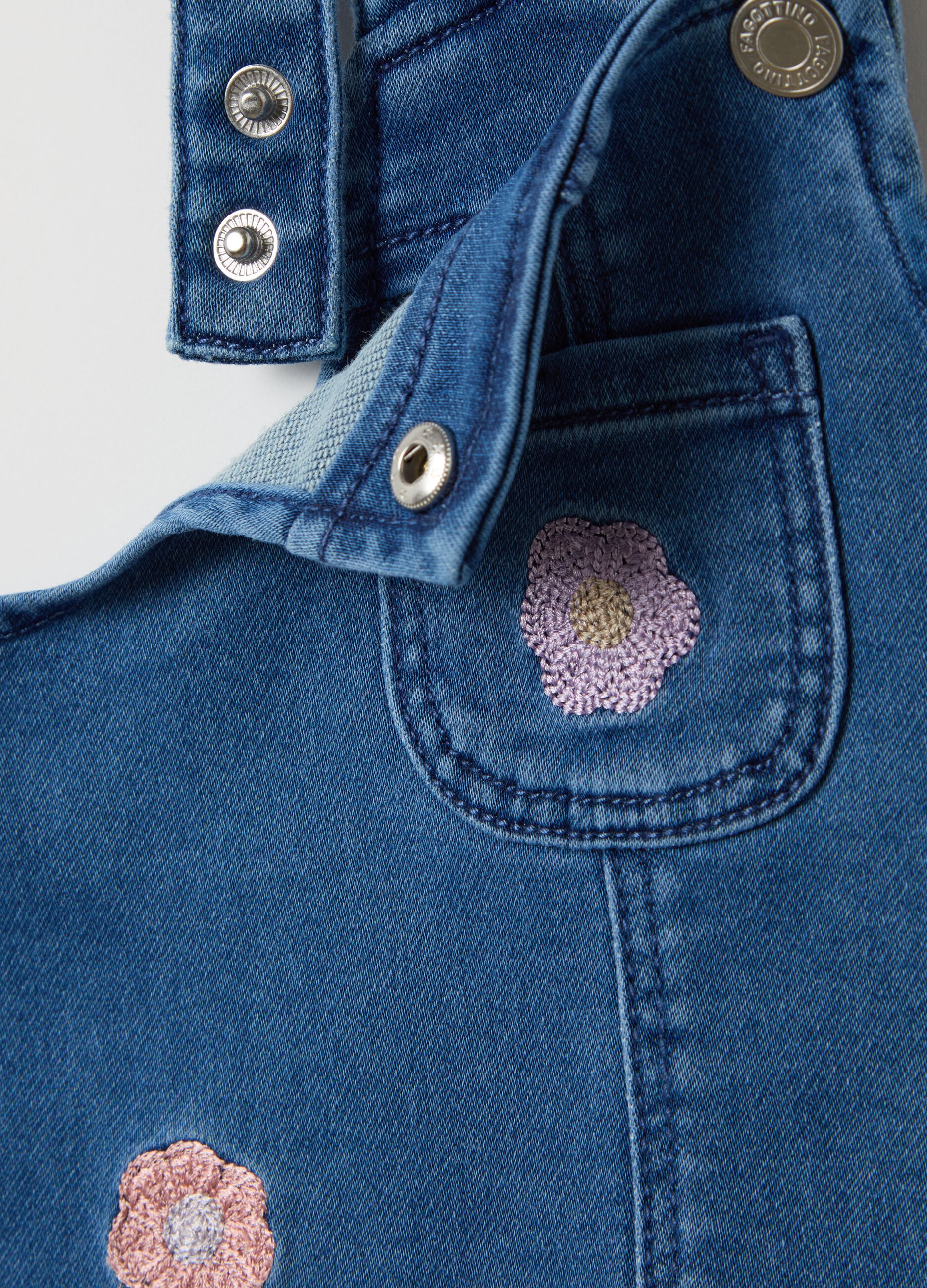 Denim pinafore with flowers embroidery