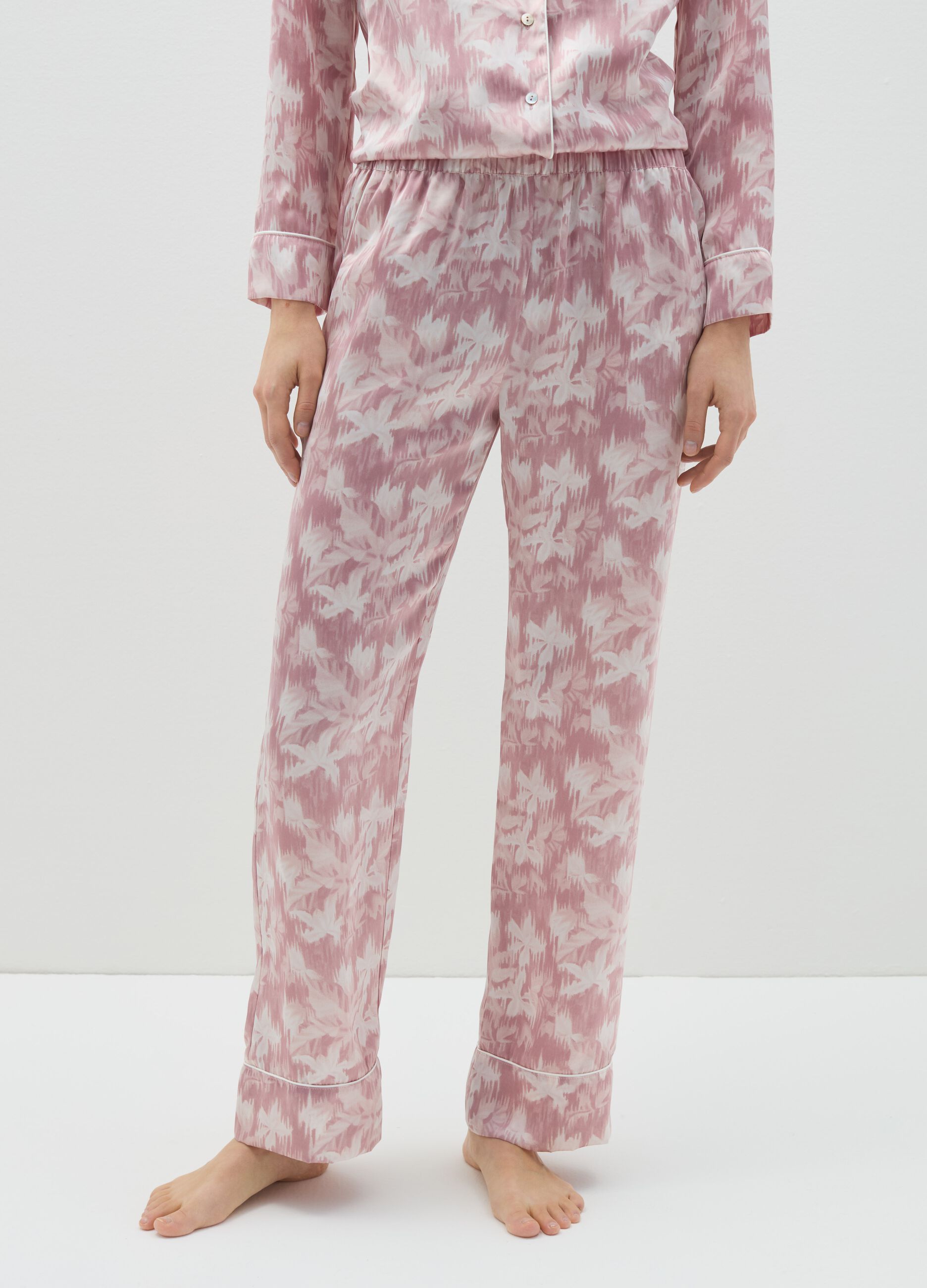 Pantalone pigiama in satin rosa e bianco