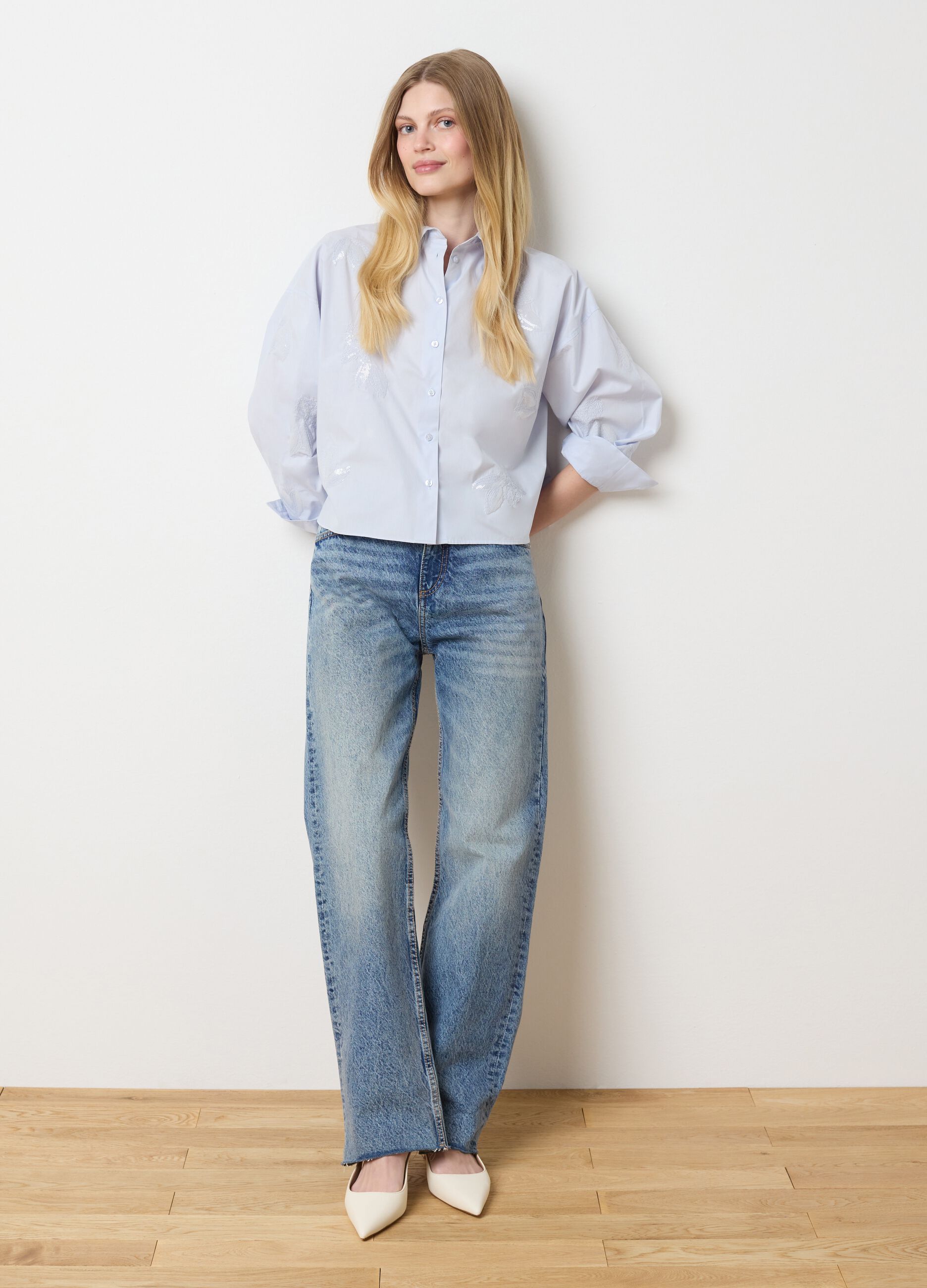 Light blue cropped shirt with floral embroidery