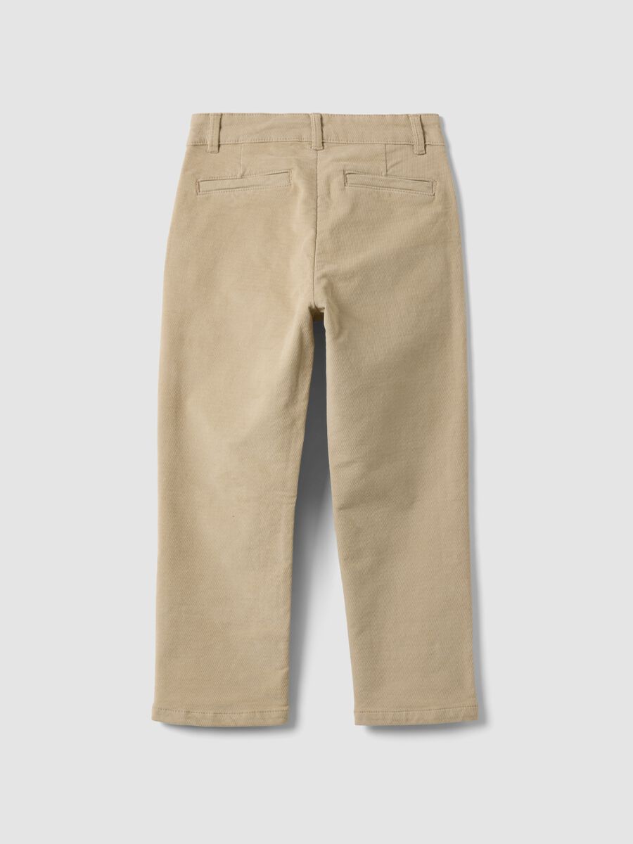 Pantaloni chino beige in cotone elasticizzato a coste_1