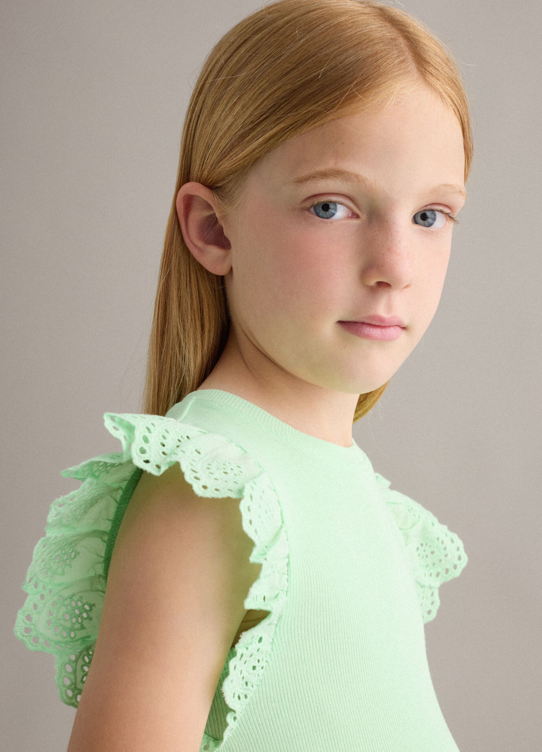 Girls&rsquo; green stretch cotton vest top with ruffles
