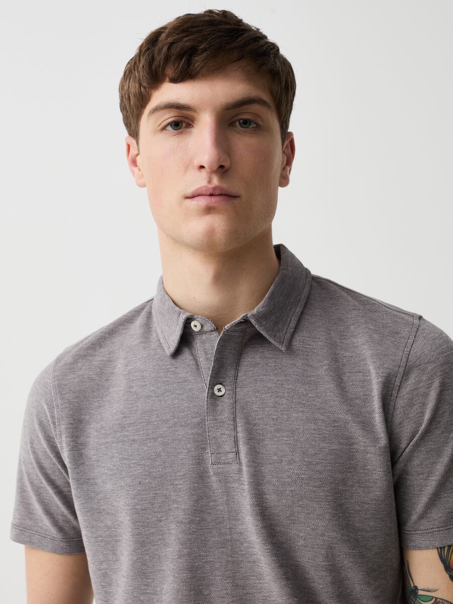 Piquet polo shirt with two-tone jacquard weave_1