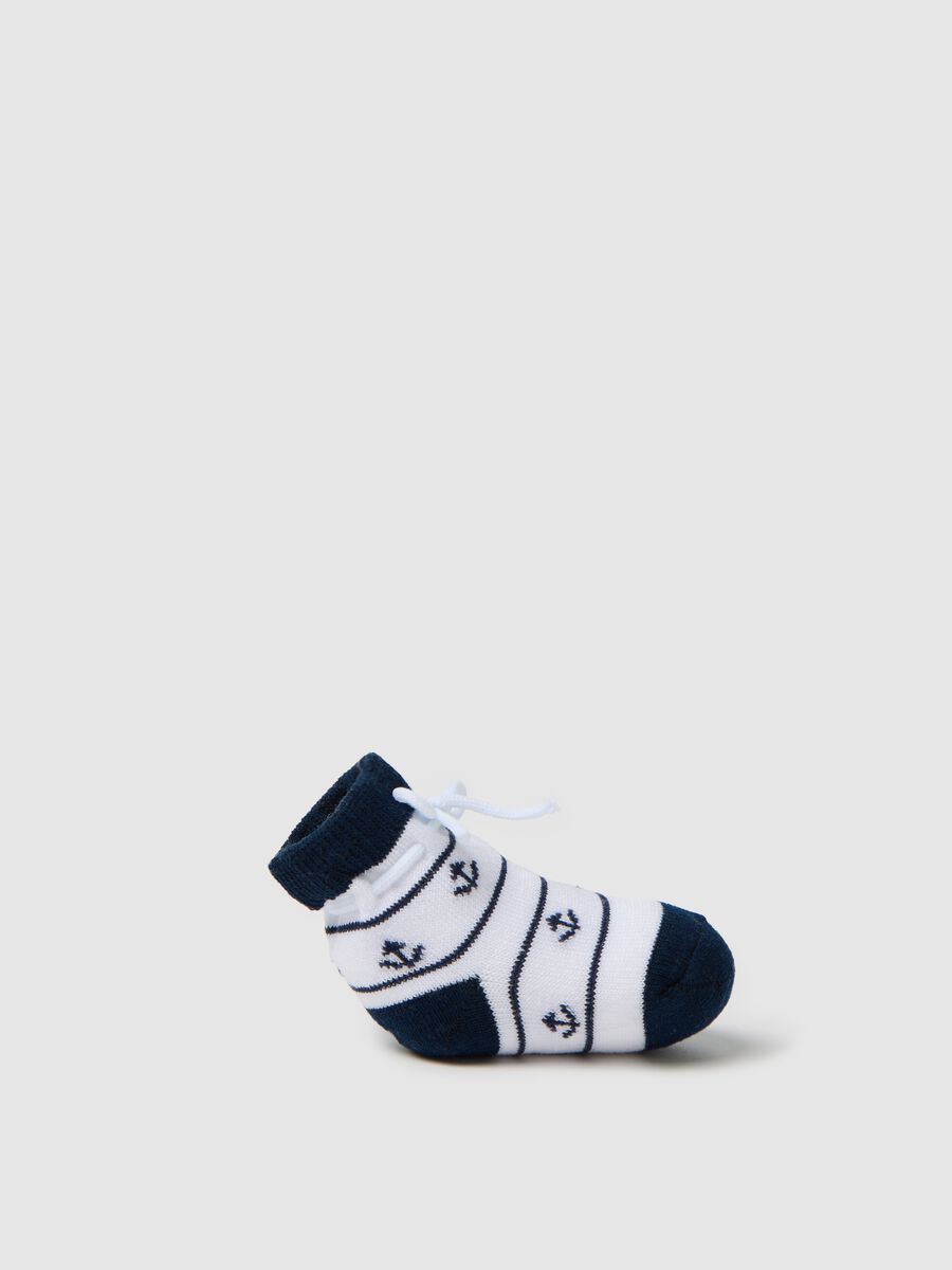 White and blue knit shoes with anchors embroidery_0