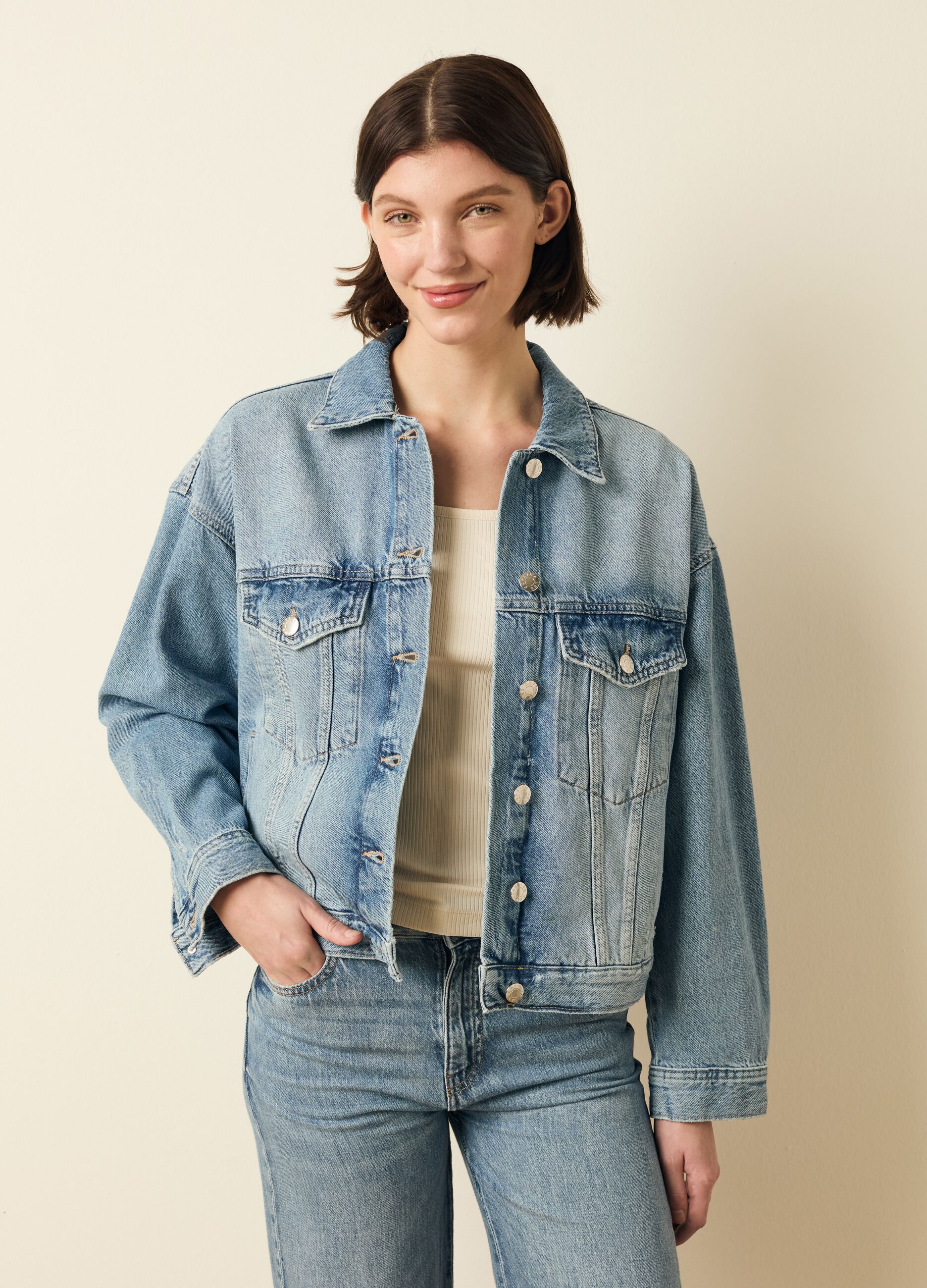 Giacca corta in denim acid wash