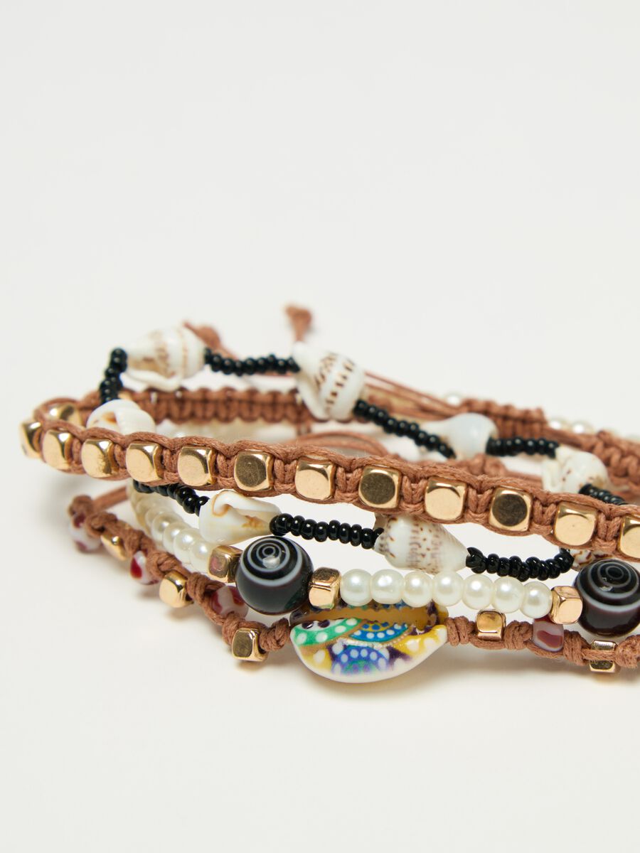 Set of four bracelets with beads and shells_1