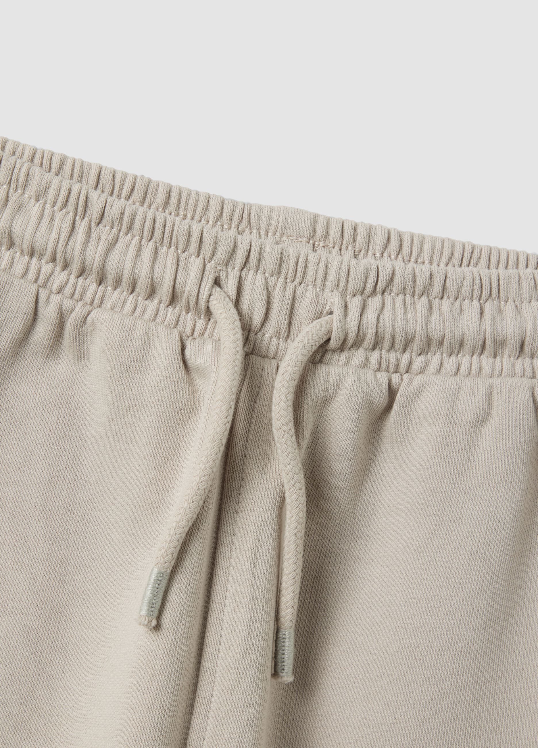 Grey jogger trousers in pure organic cotton with drawstring for baby boy