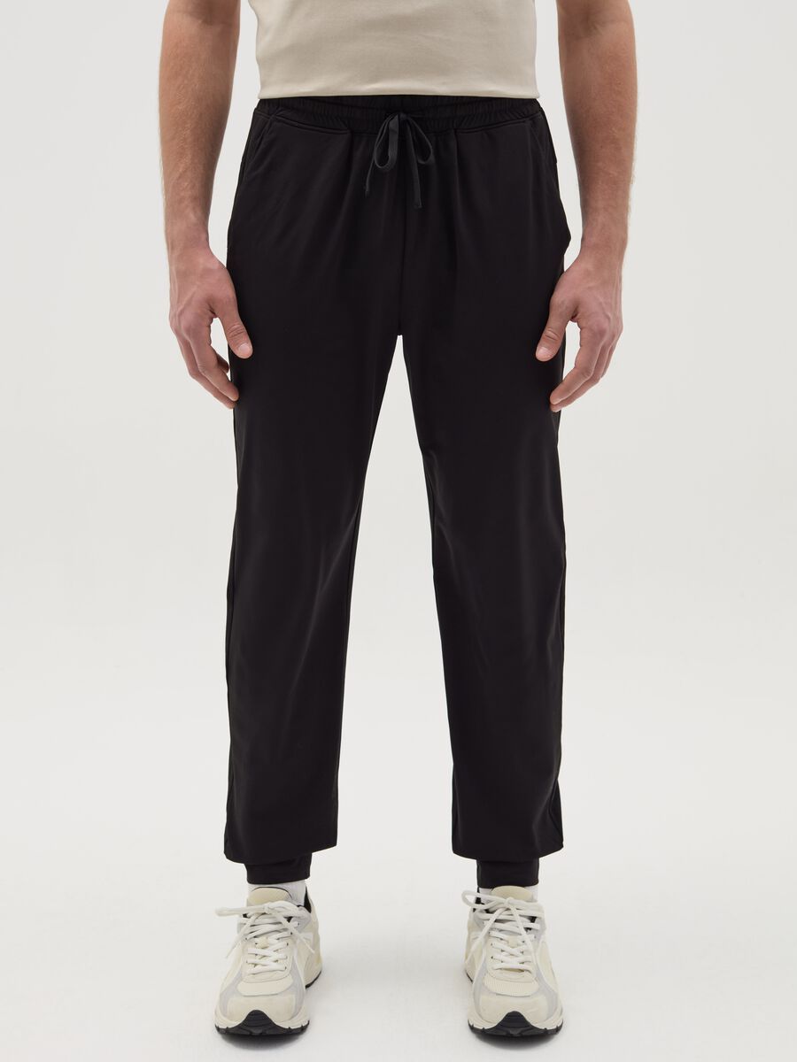 Technical fabric joggers with drawstring_1