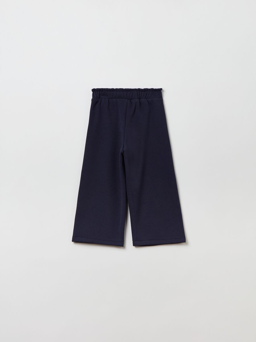 Pantaloni wide leg con fiocco tartan _1