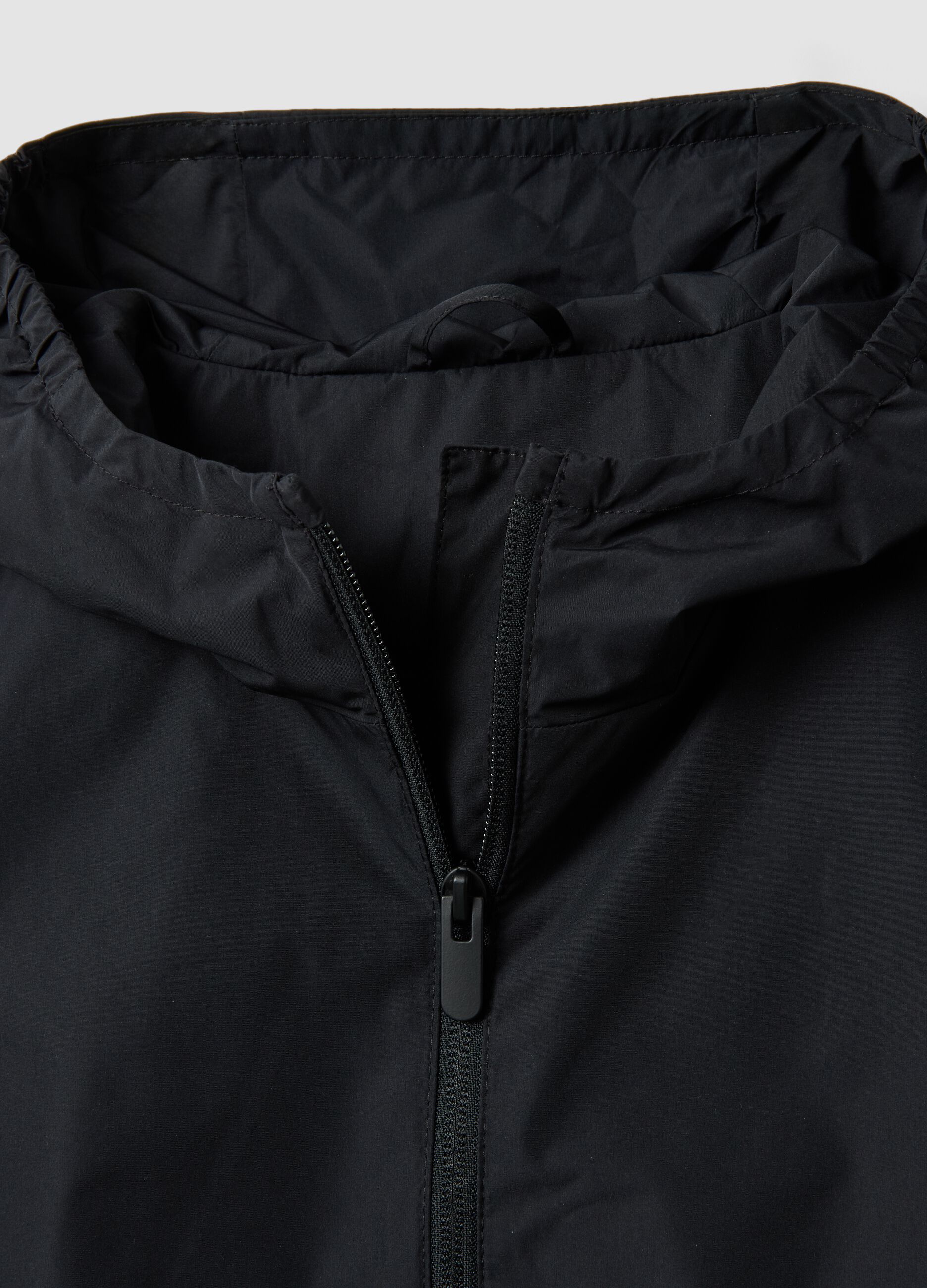 Black hooded rain jacket with zip for girls