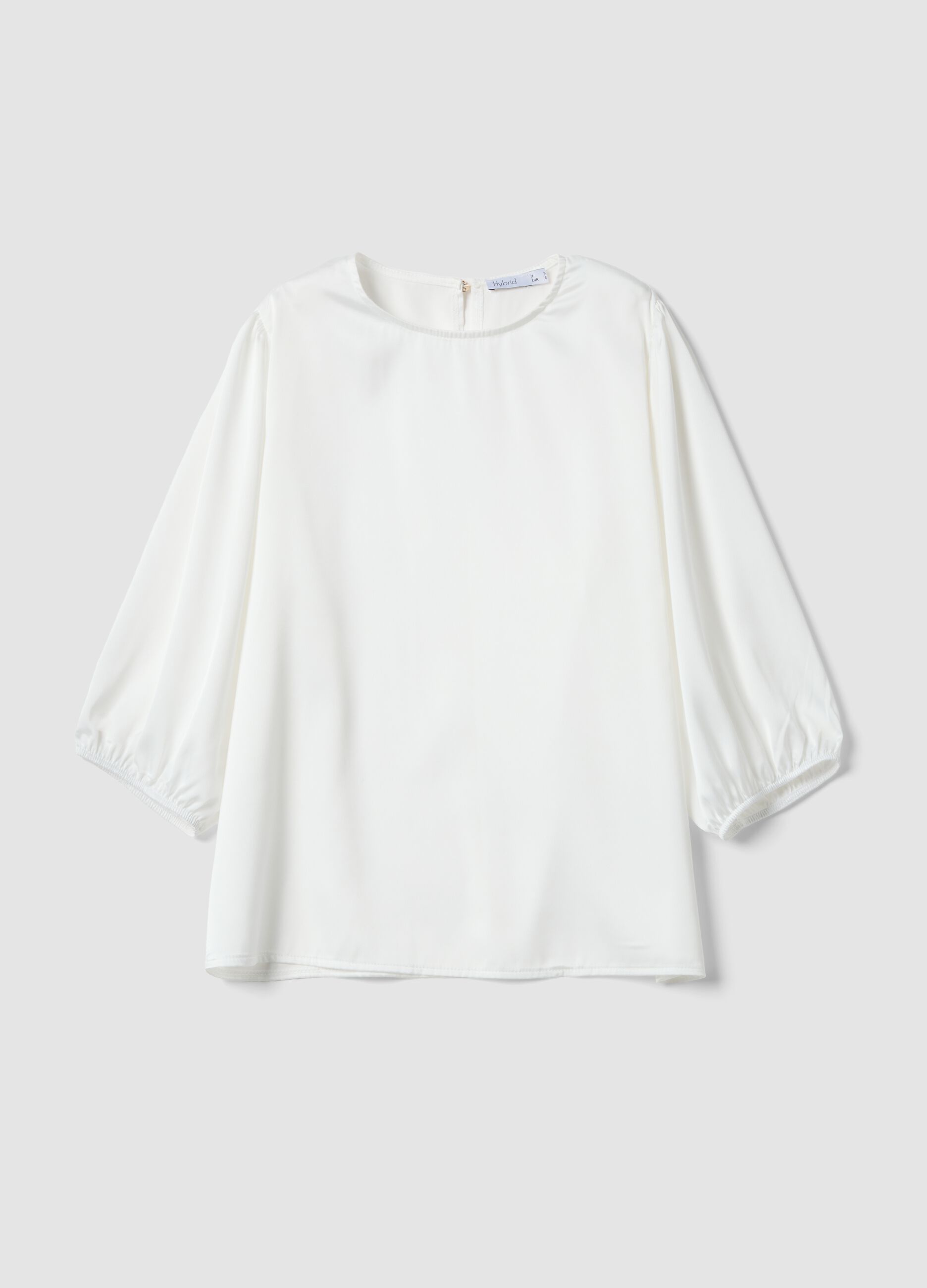 White long-sleeve top with wide sleeves