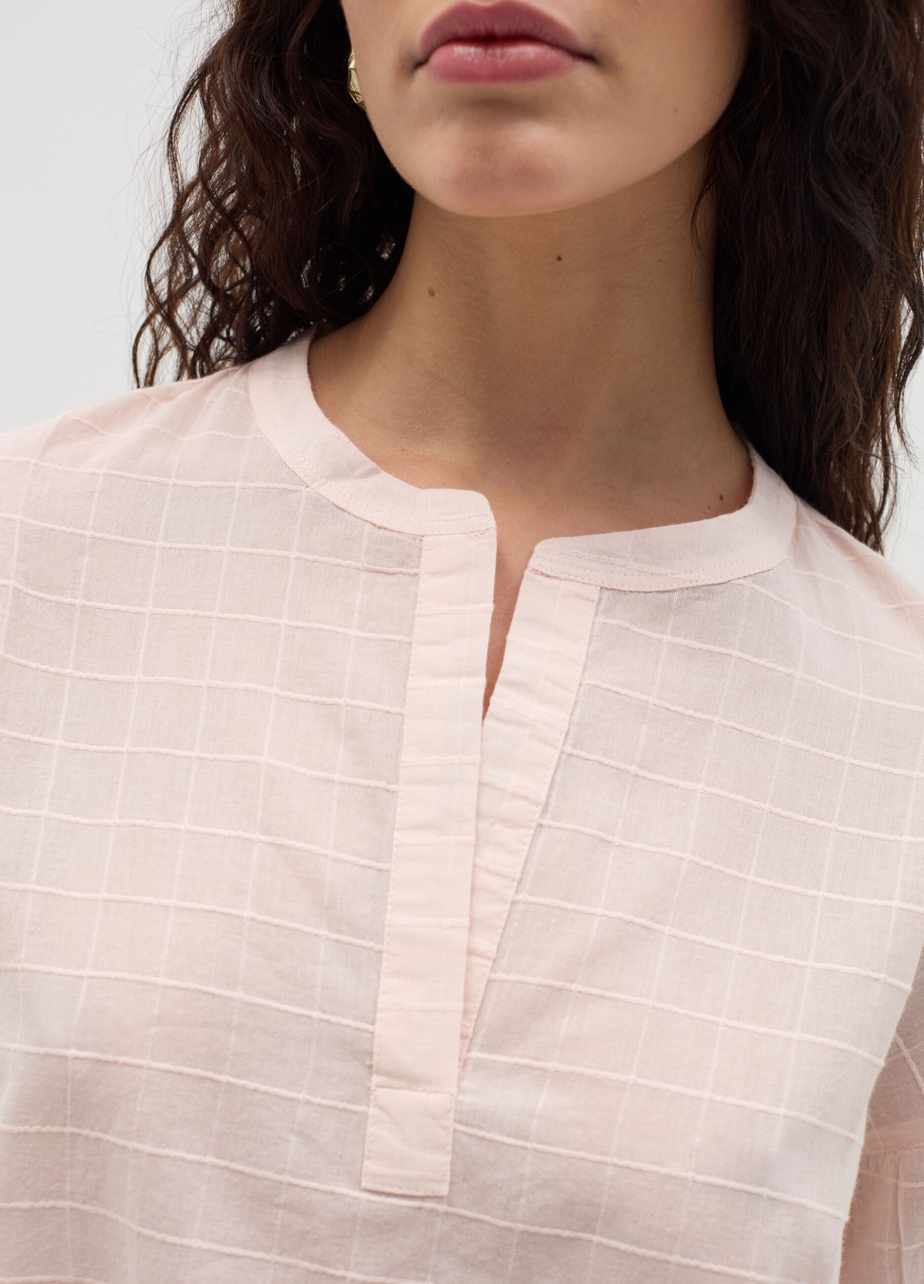 Blouse with raised stitching