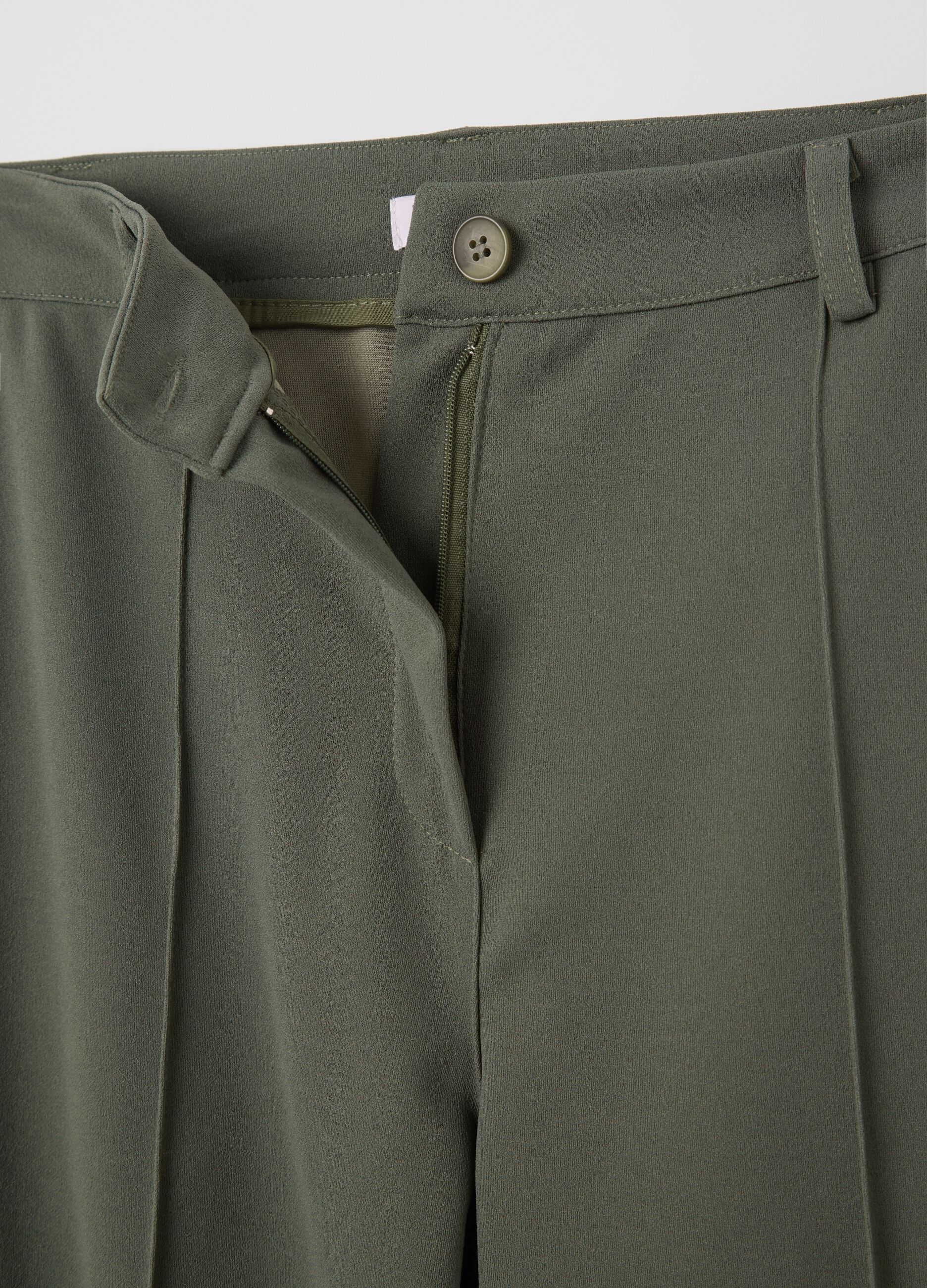 Green palazzo trousers with pockets