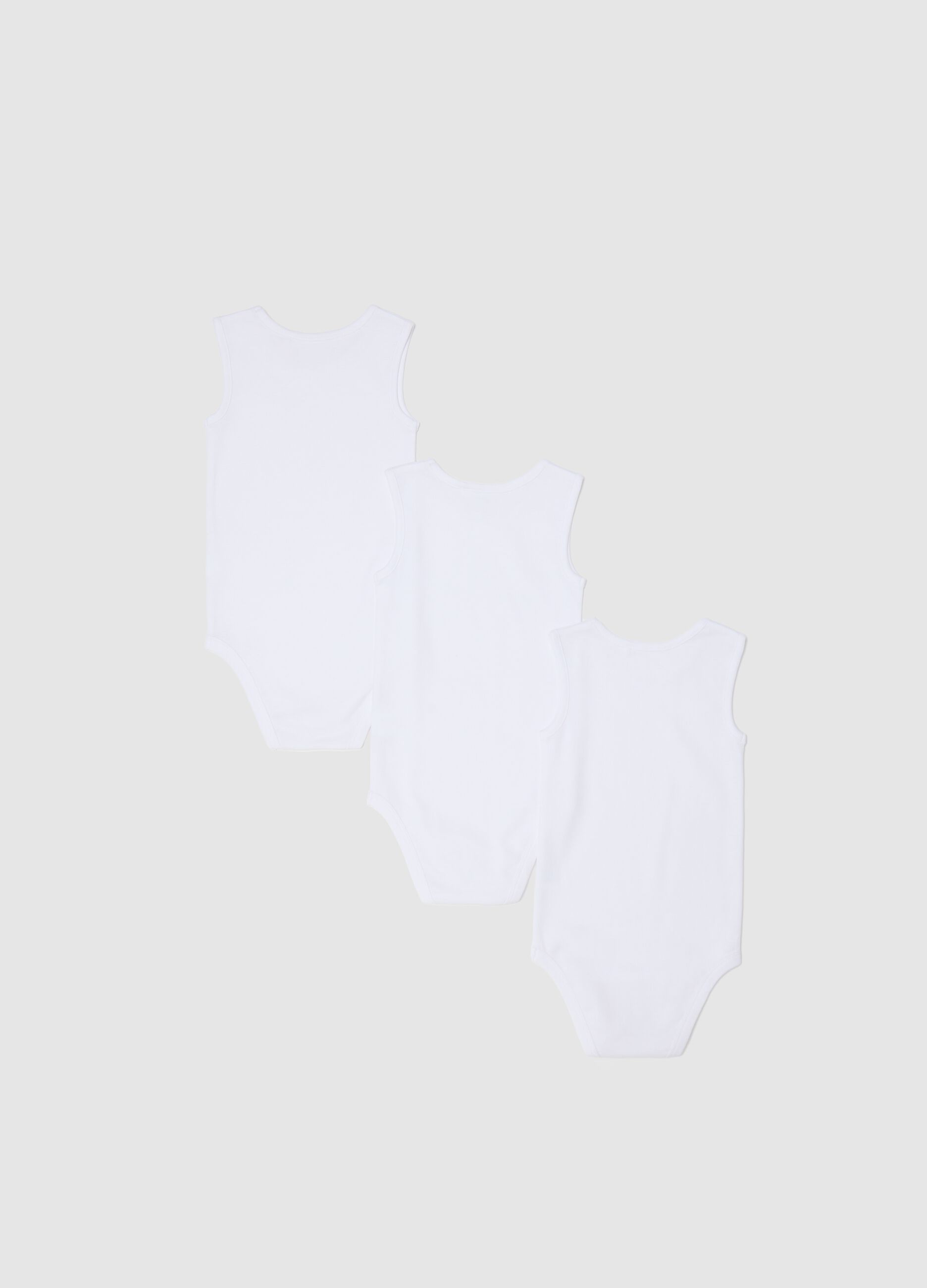 Three-pack white sleeveless bodysuits in organic cotton