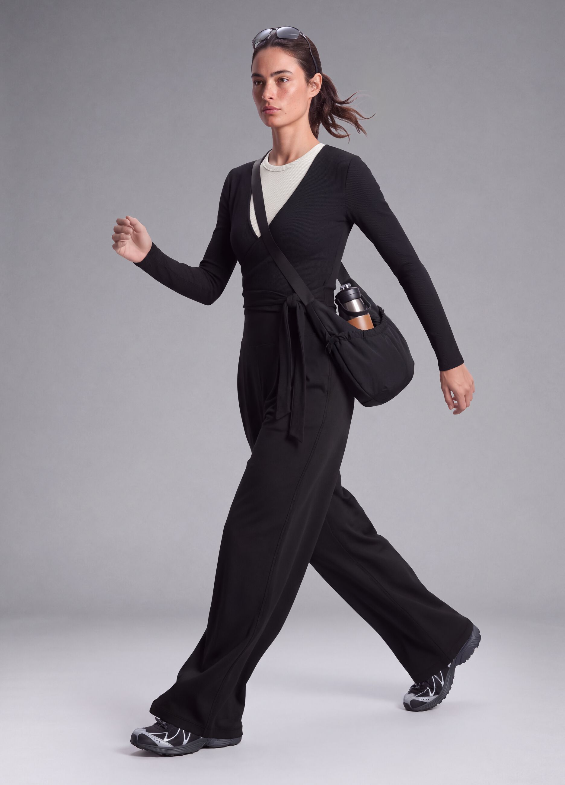 Black wide-leg stretch-fabric trousers