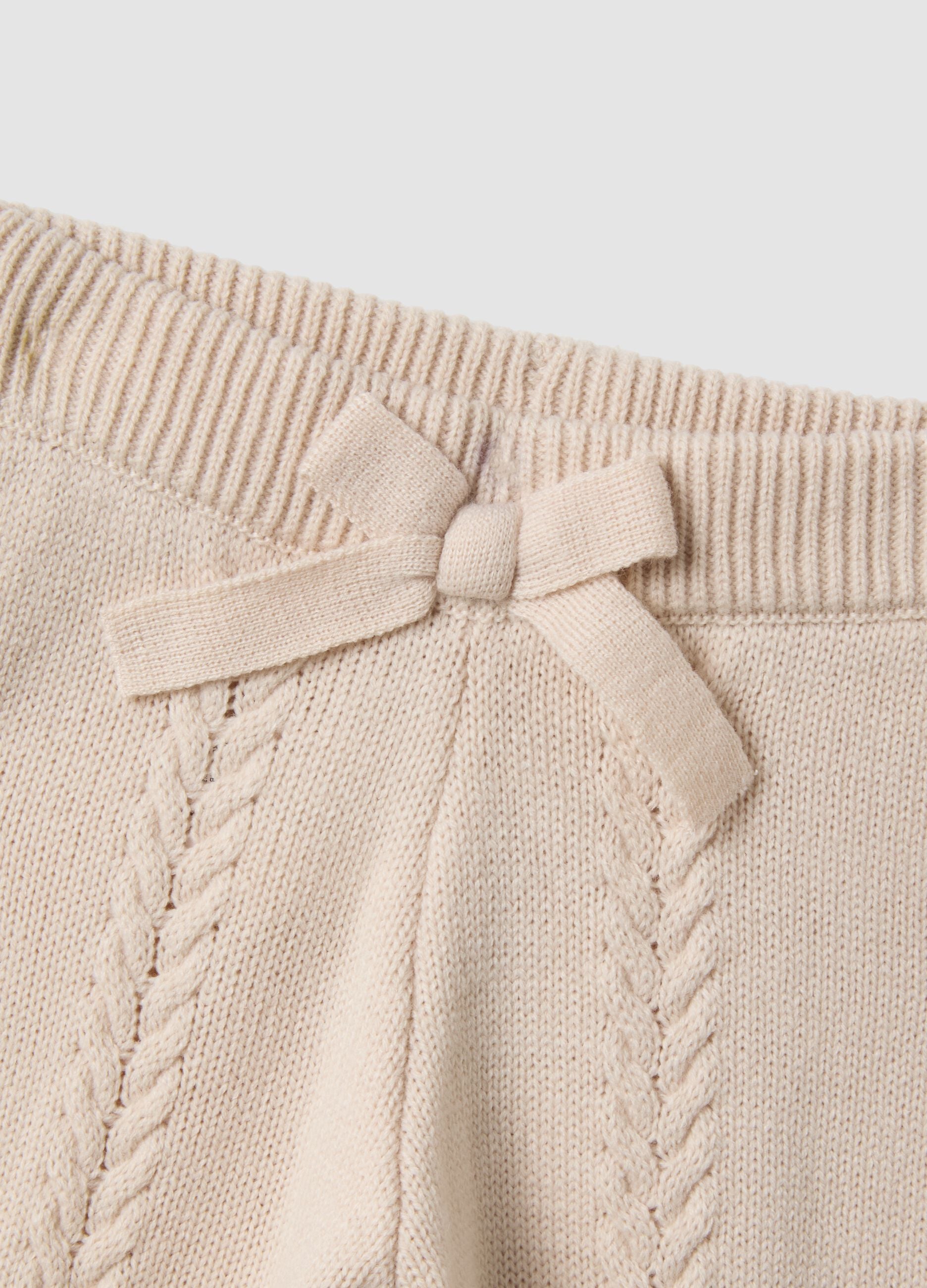 Beige regular-fit trousers with bow