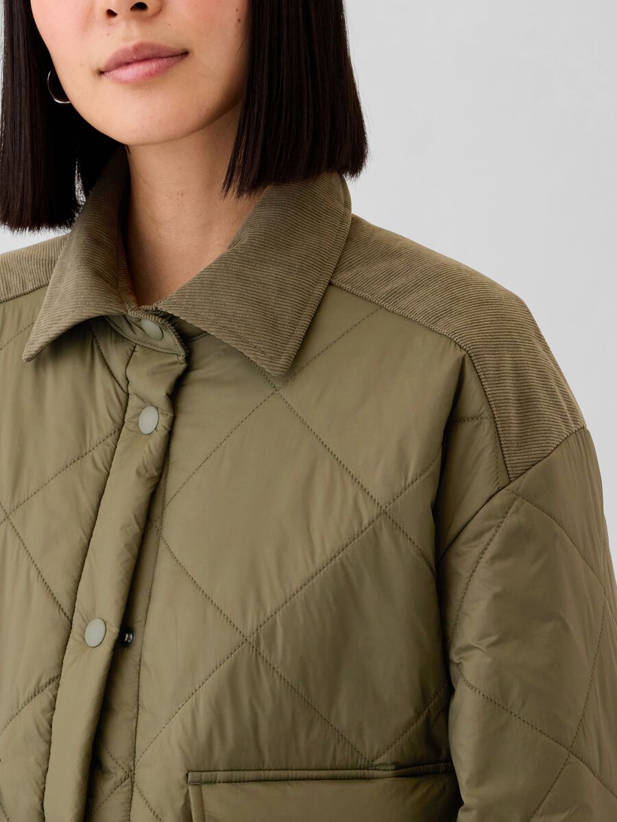 Short quilted jacket with corduroy details_3
