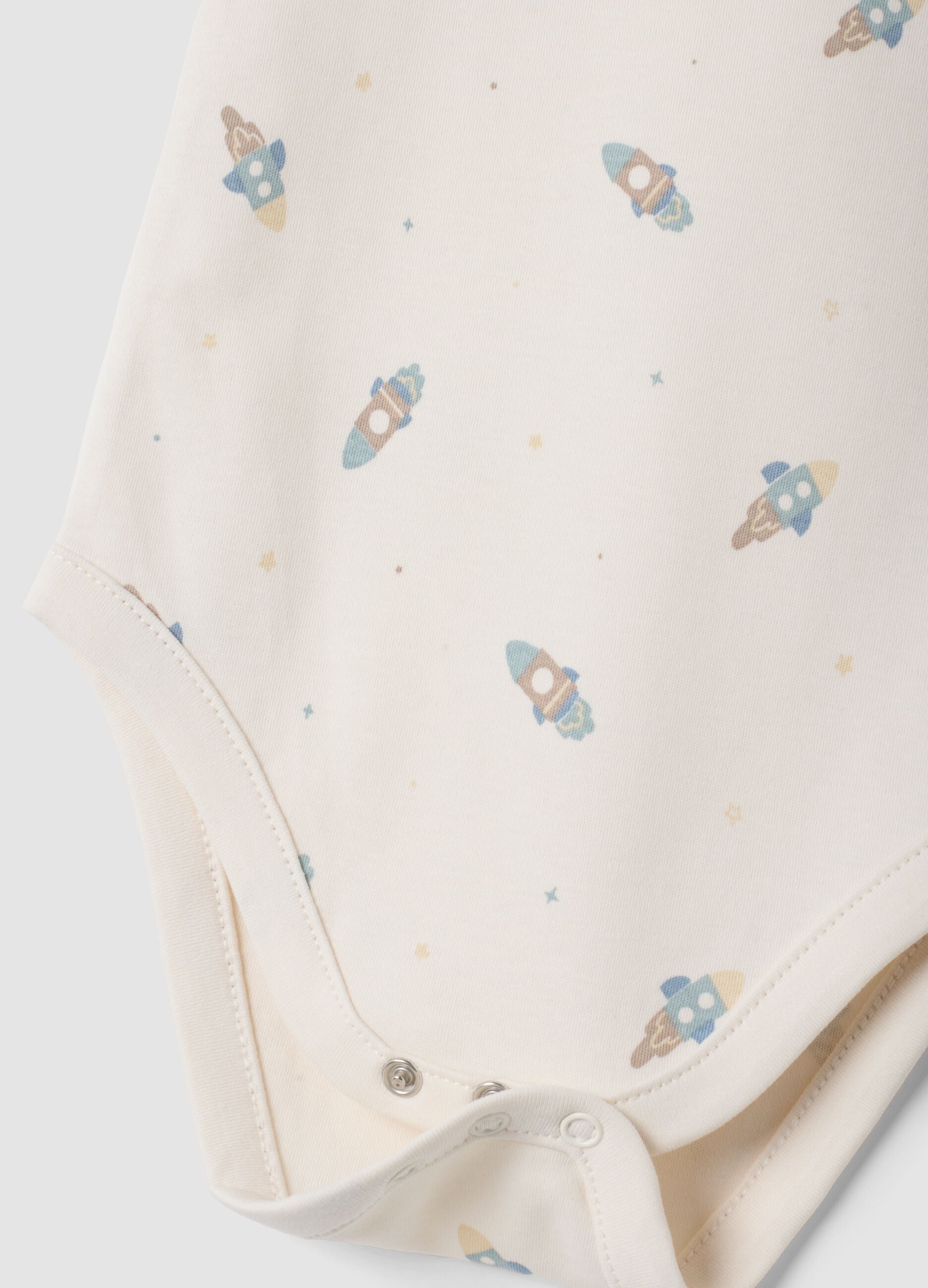 3-pack organic cotton crew-neck bodysuits in sugar paper blue, ivory white and light blue