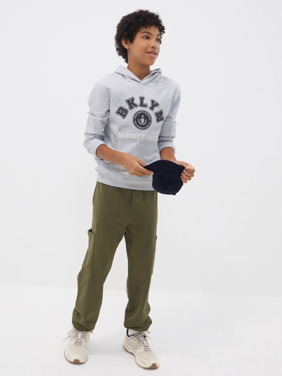 Green pure cotton relaxed cargo jogger trousers for boys_0