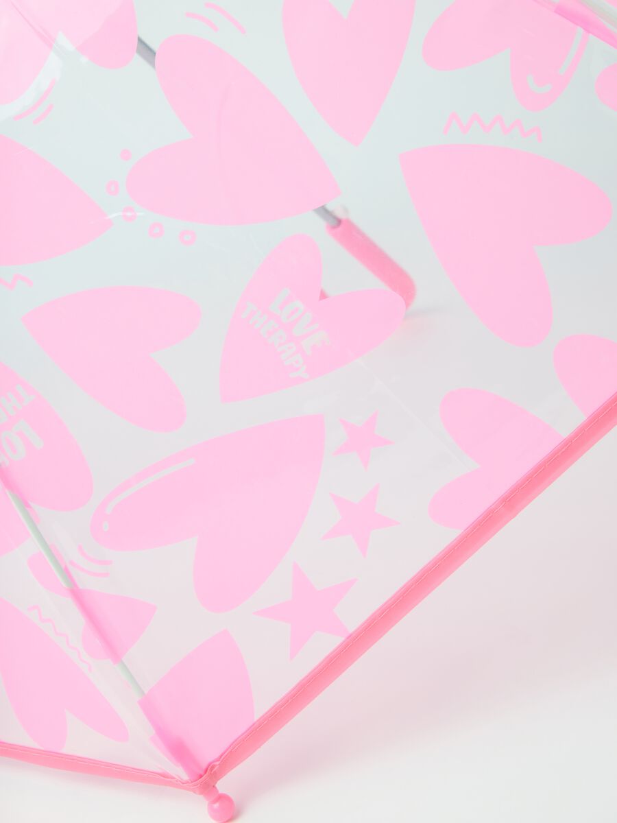 Ombrello trasparente da bambina con cuori rosa_1