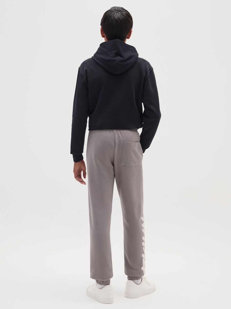 Grey jogger trousers for boys in pure cotton oversized fit_1