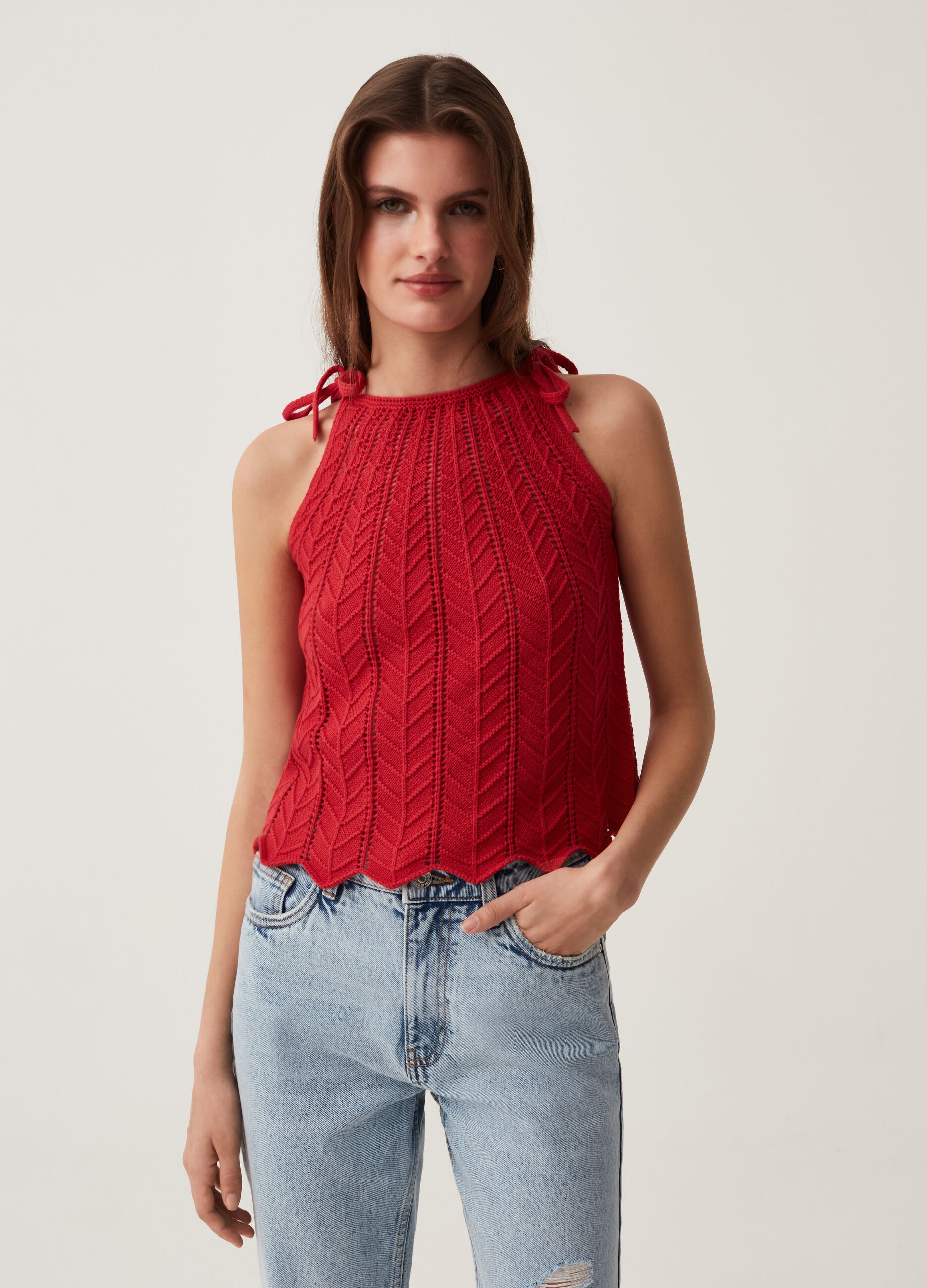 Crochet cotton tank top with halter neck.