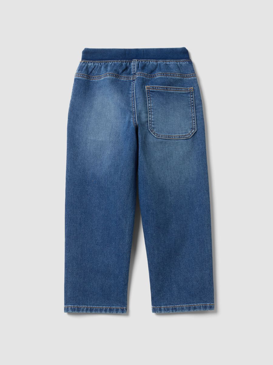 Jogger denim blu in cotone elasticizzato con vita elasticizzata per bambino_1