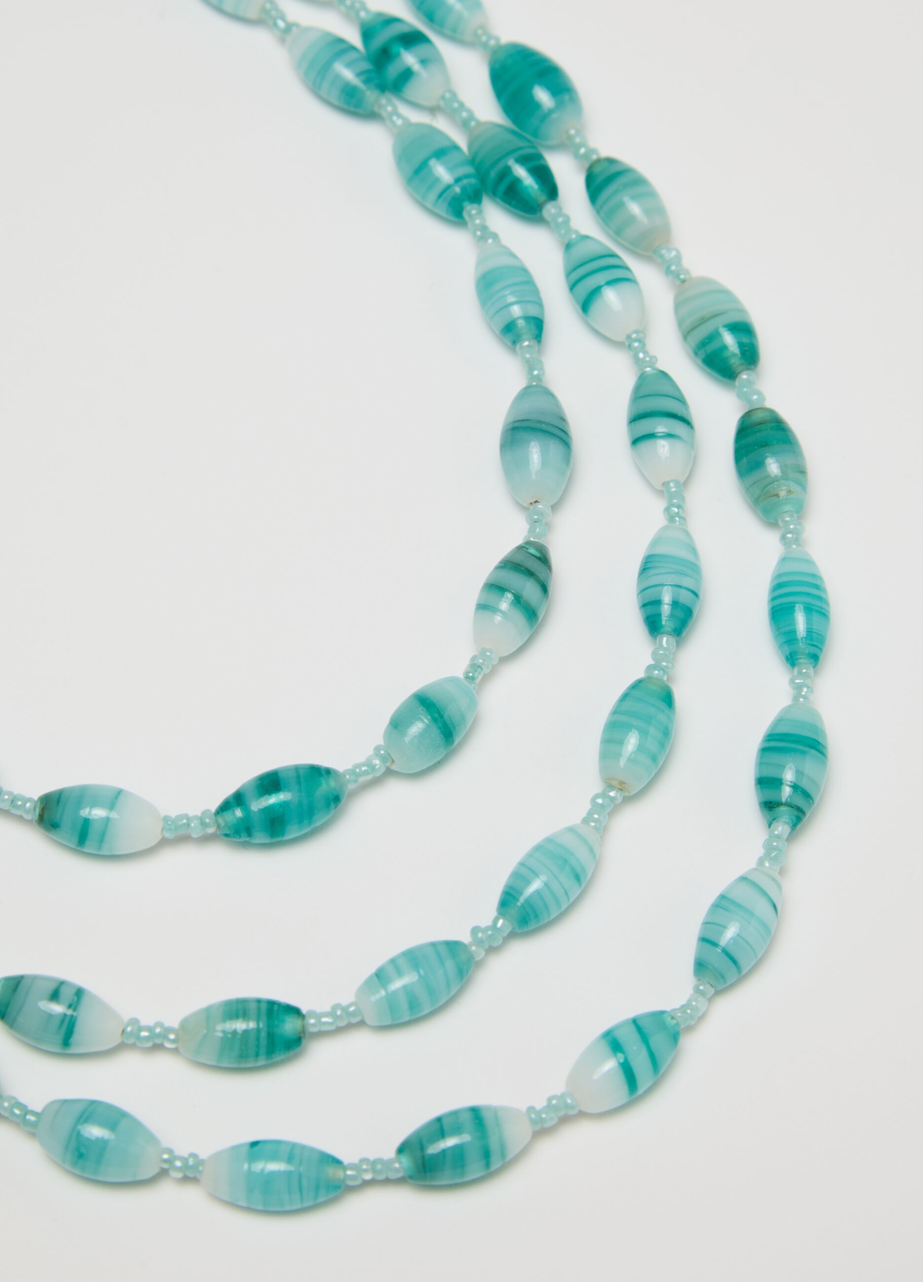 Collana multifili con perline azzurre