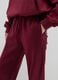 Red regular fit cotton blend trousers_3