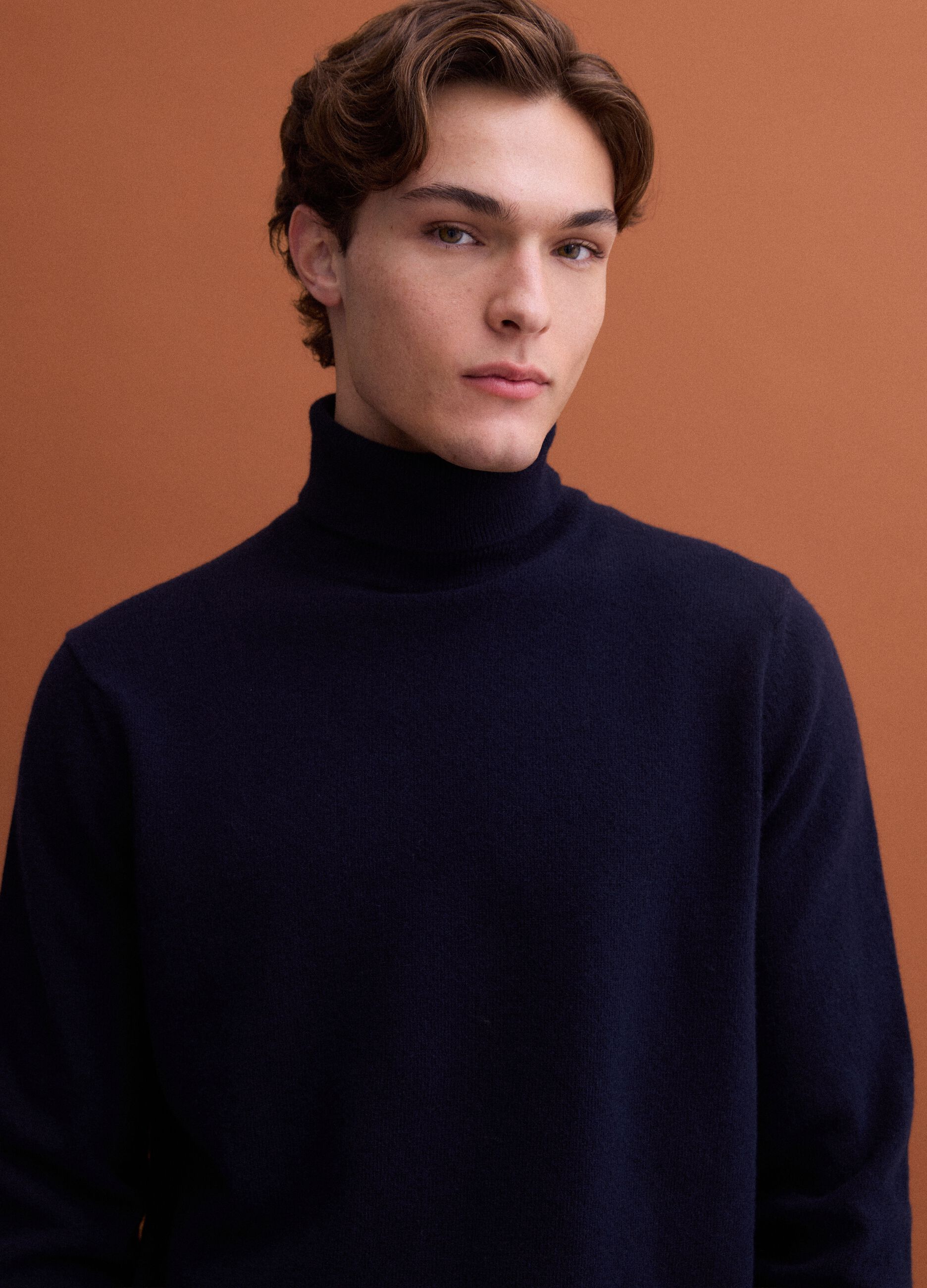 Navy blue pure lambswool roll-neck jumper