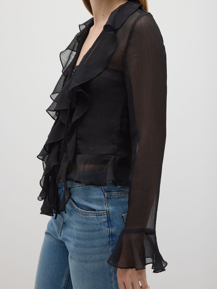 Blusa nero regular fit con volant_3
