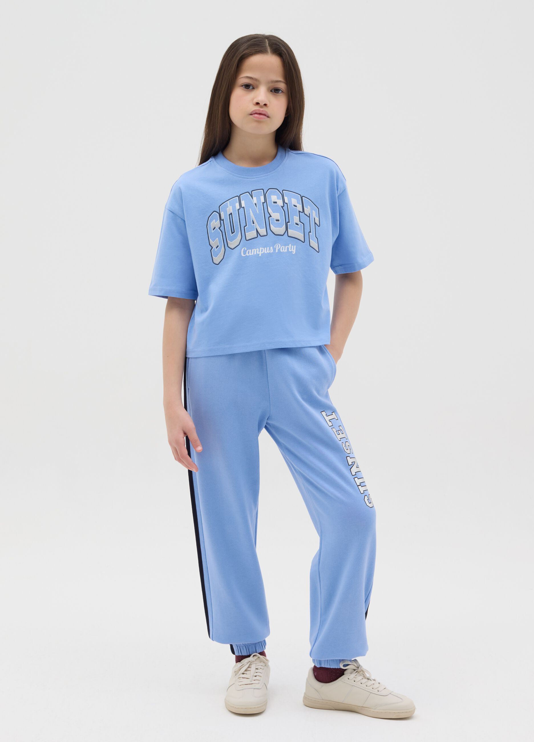 Joggers with contrasting bands and "Sunset” print