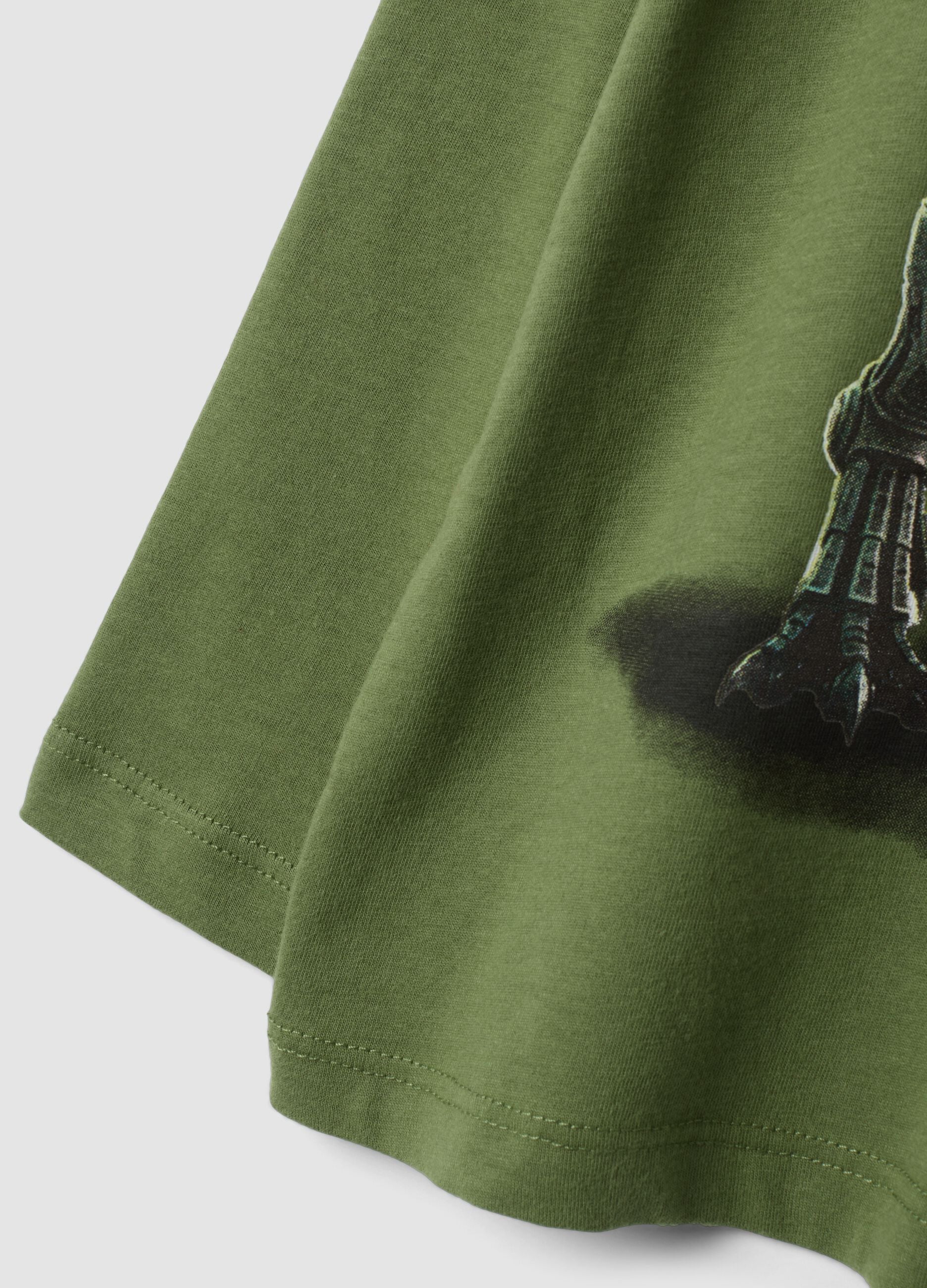 T-shirt over verde in puro cotone organico con stampa dinosauro