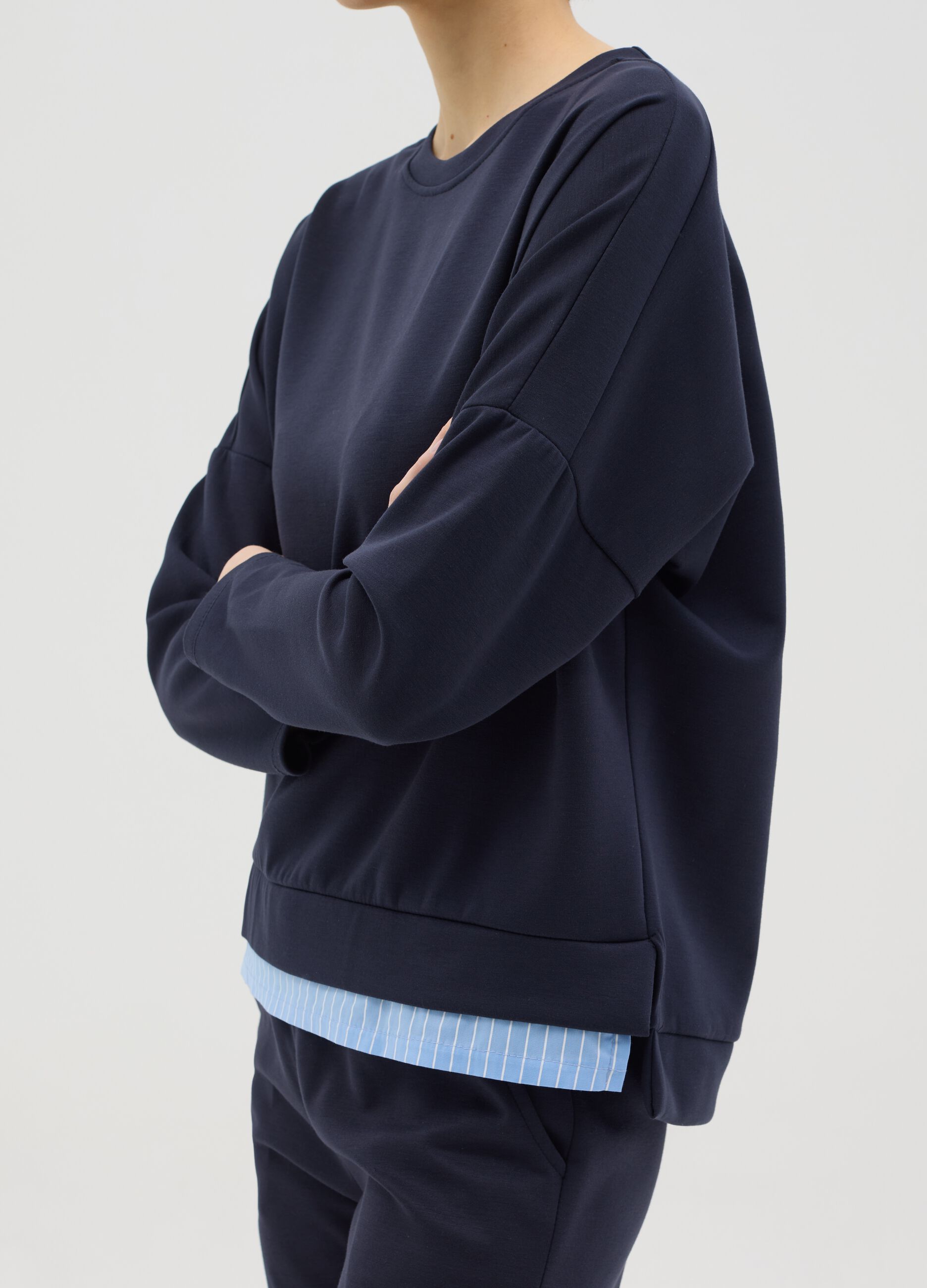 Blue top with layered-effect hem