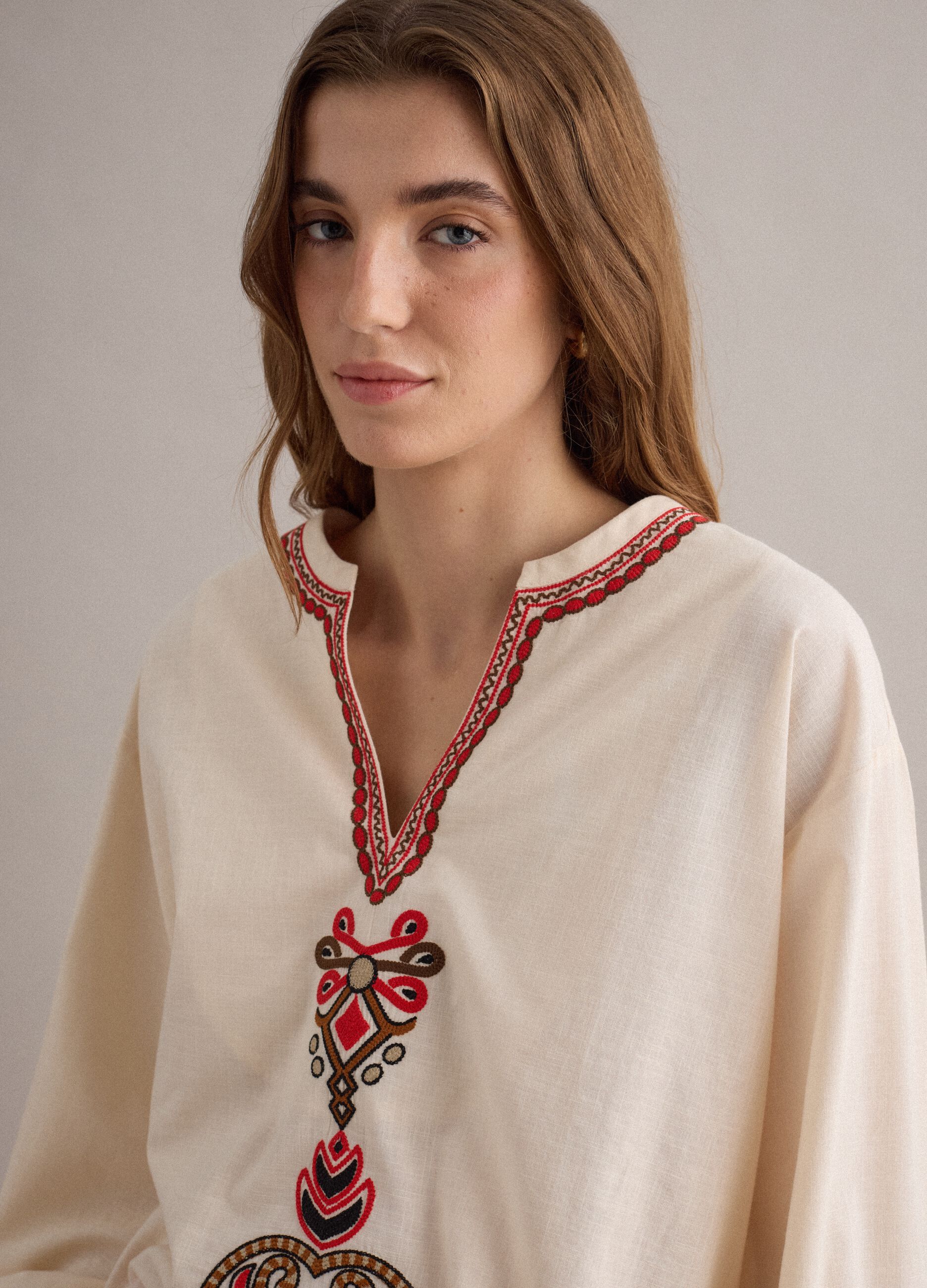 White pure cotton regular-fit shirt with embroidery and V-neck