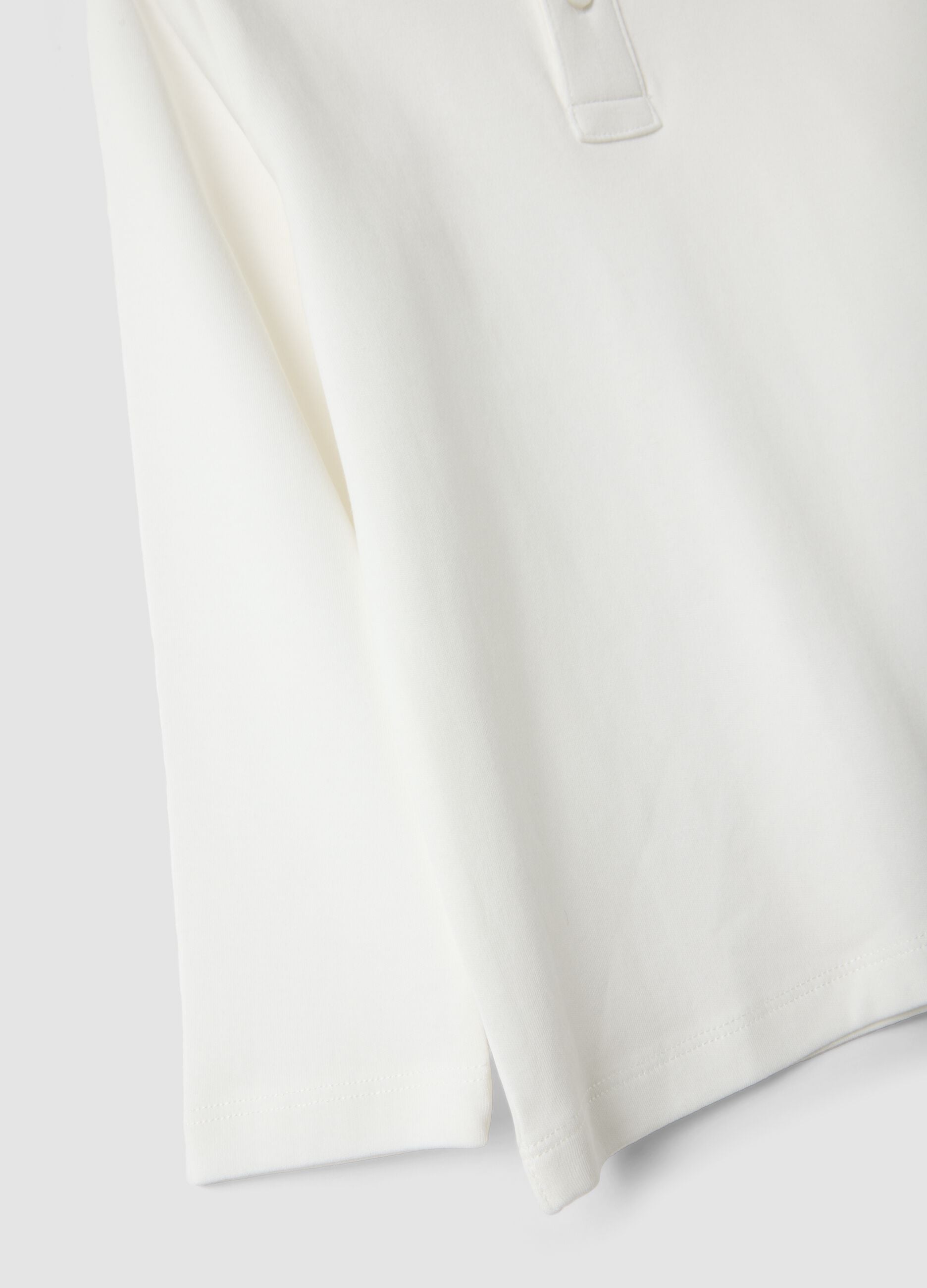 Polo bianca in puro cotone organico a maniche lunghe