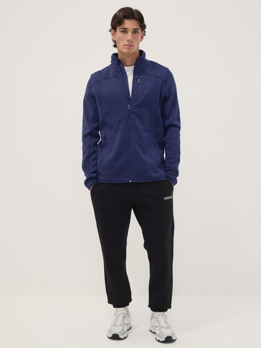 Felpa blu full zip con collo alto e logo_1