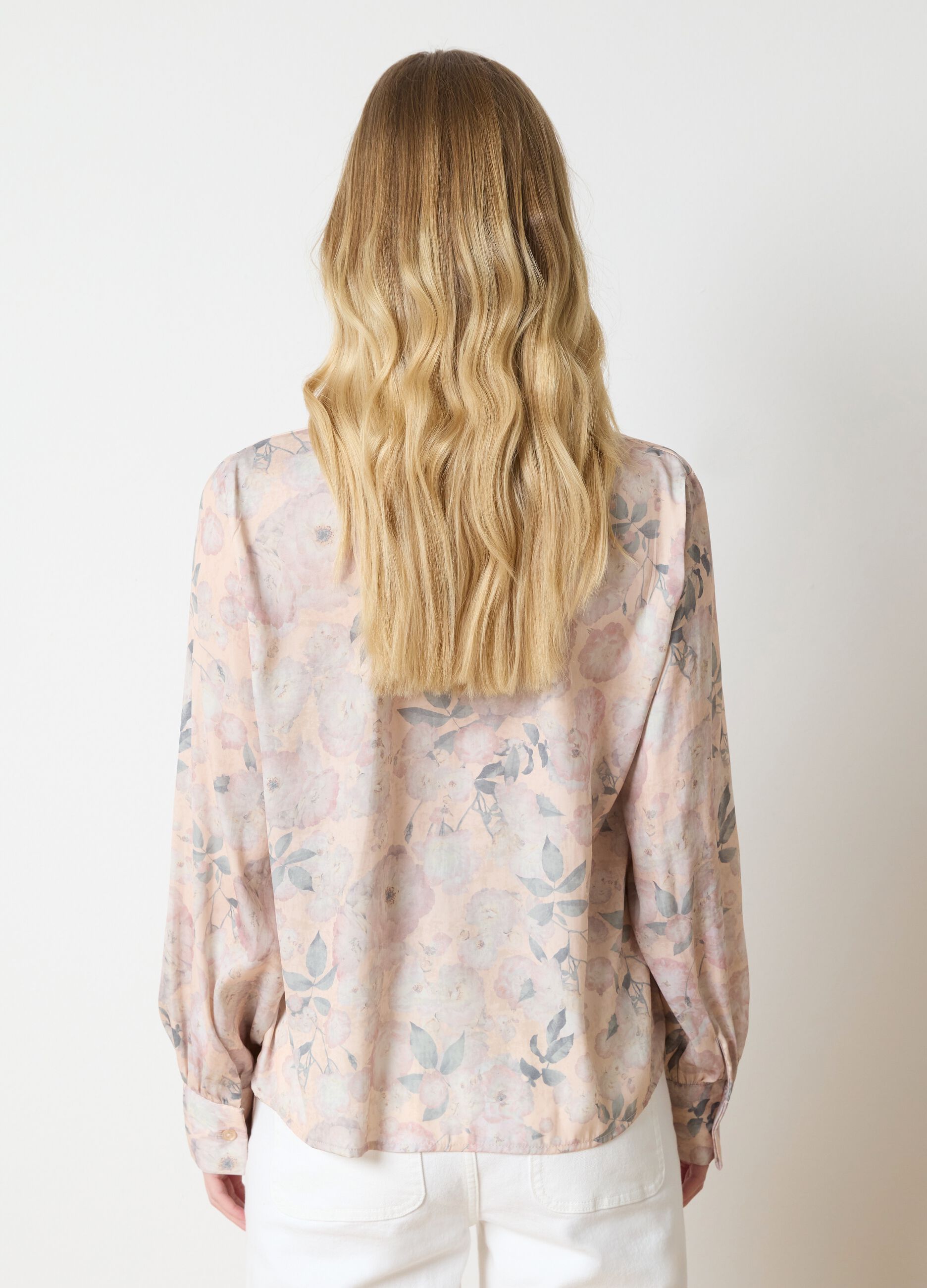 Beige blouse with floral pattern and bow