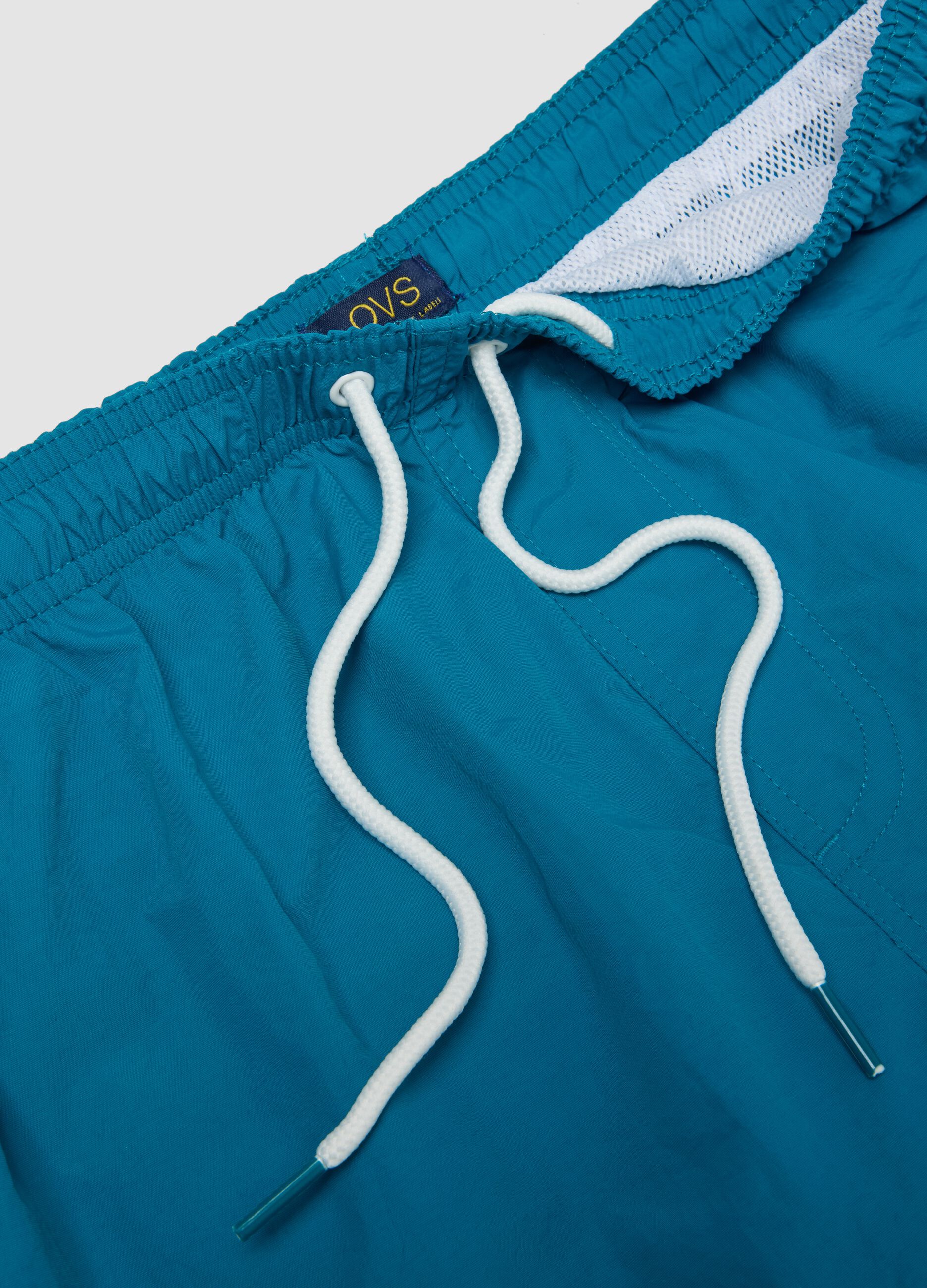 Boxer da mare azzurro con elastico in vita