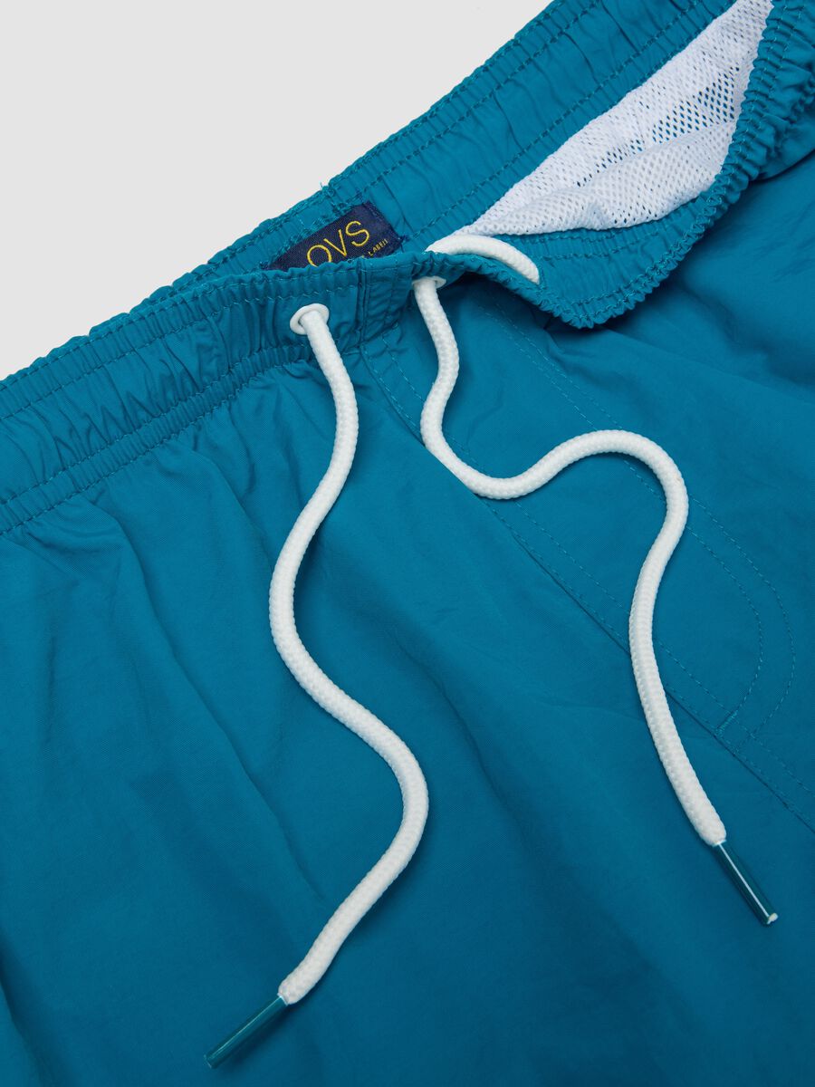 Blue swim shorts with elasticated waist_5