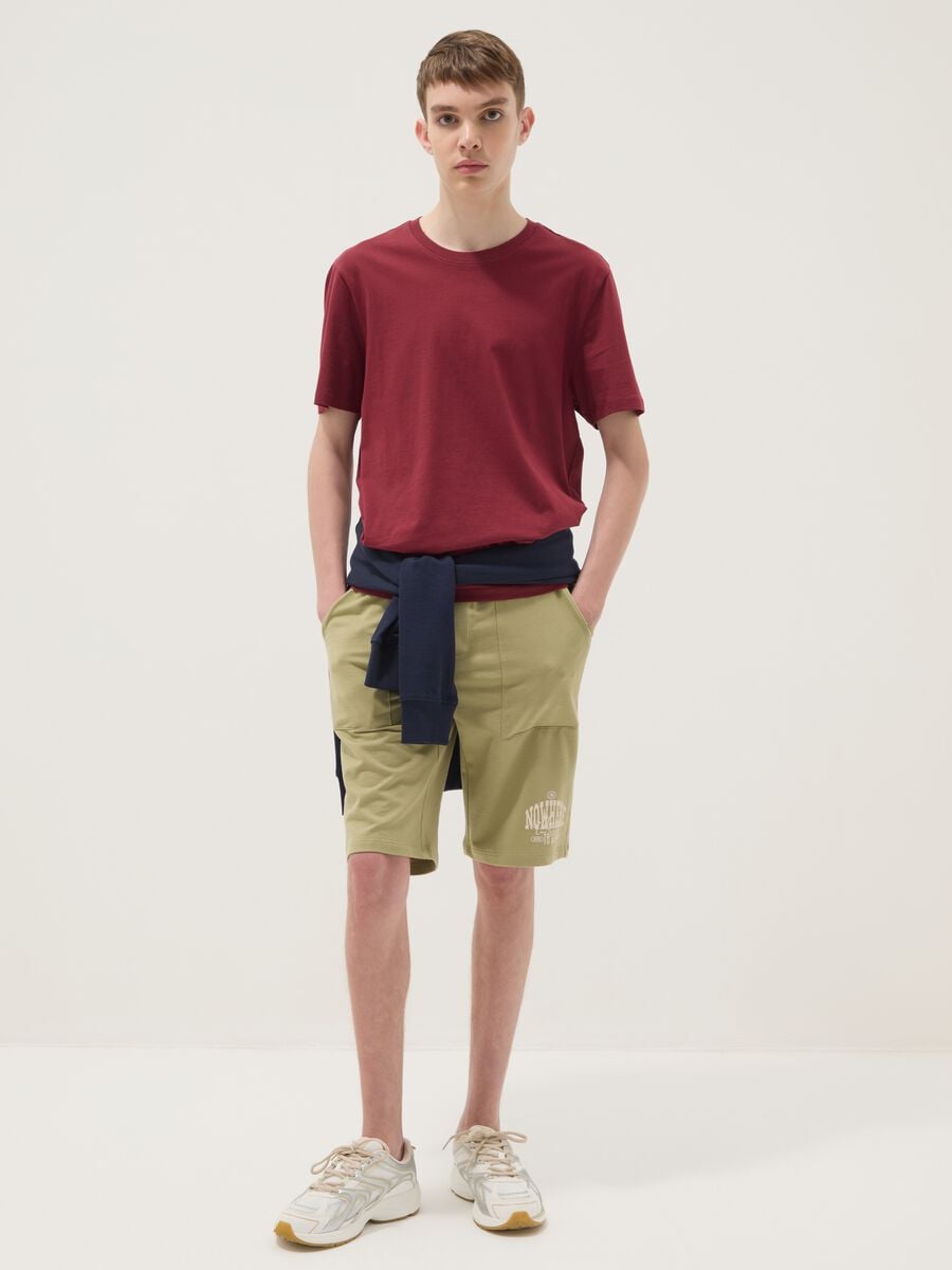 Shorts jogger verdi in puro cotone da ragazzo con vita elasticizzata_0