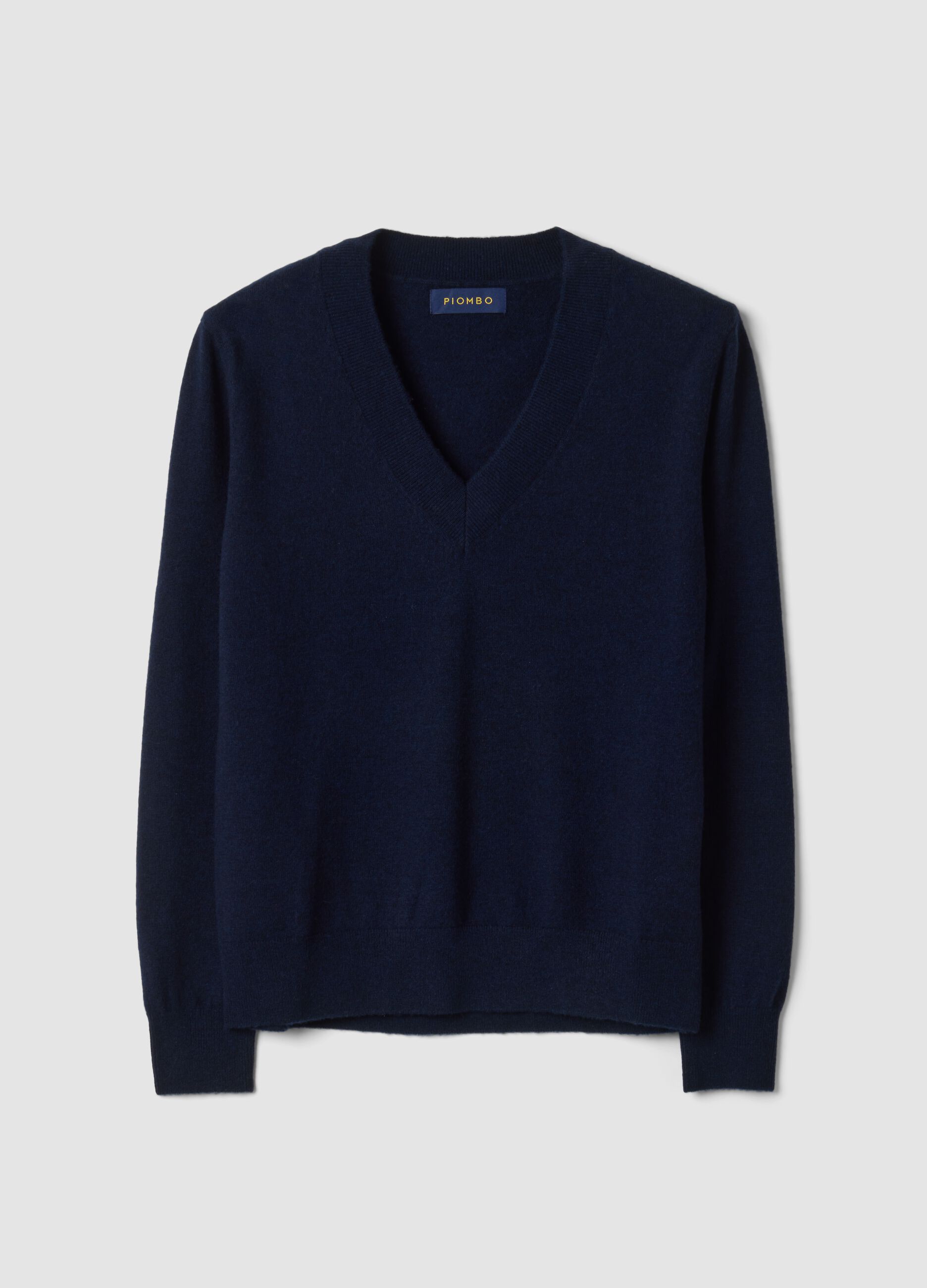 Maglia blu in pura lana con scollo profondo a V