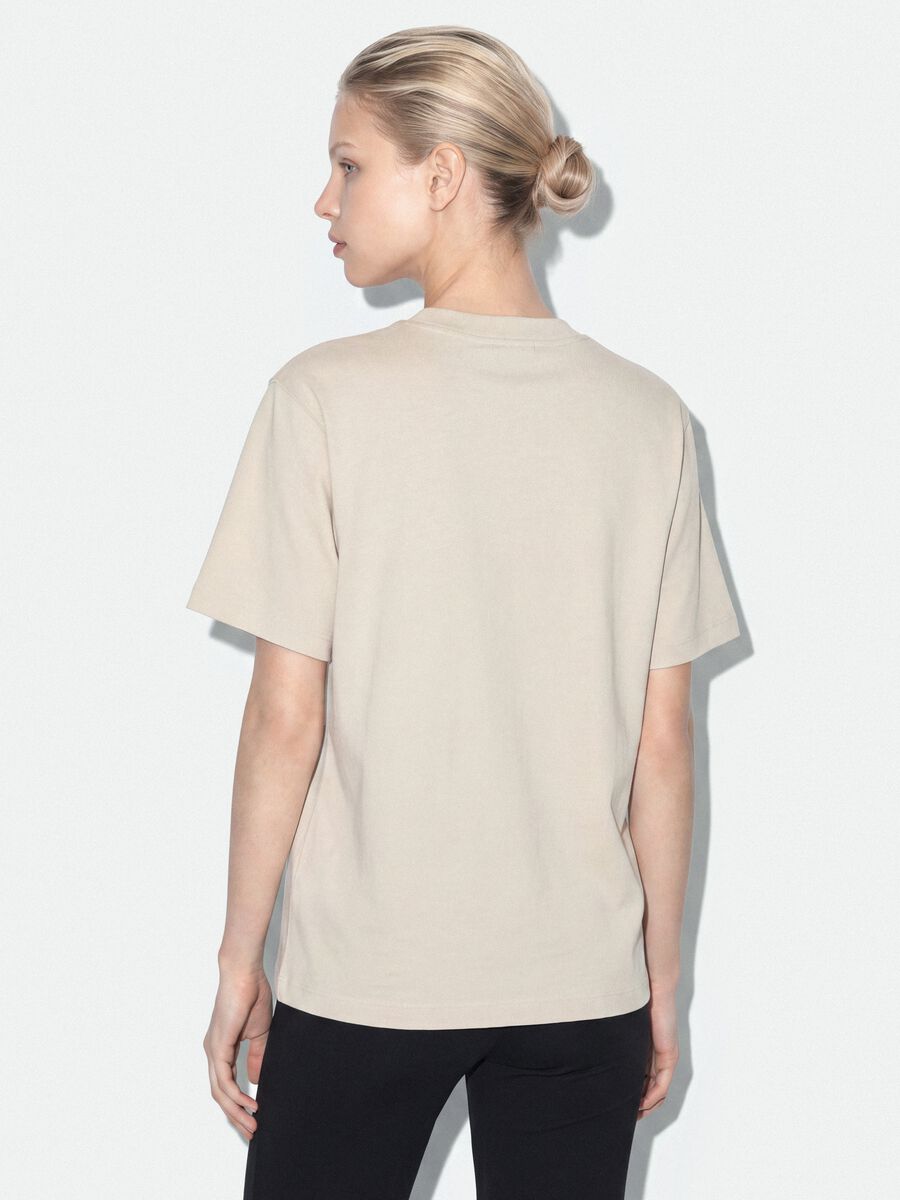 T-shirt beige relaxed fit in puro cotone con stampa teddy_2