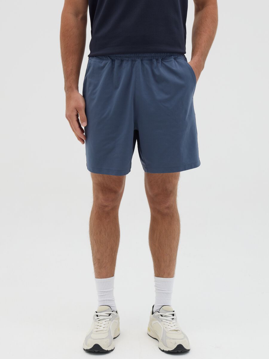 Blue Bermuda joggers in stretch fabric_1