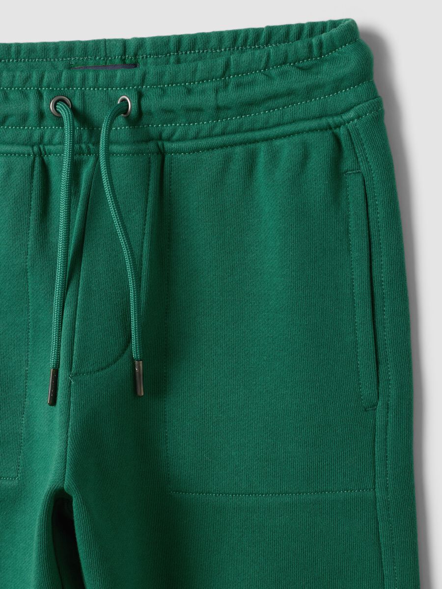 Pantaloni jogger verdi in puro cotone con vita elasticizzata per bambino_2
