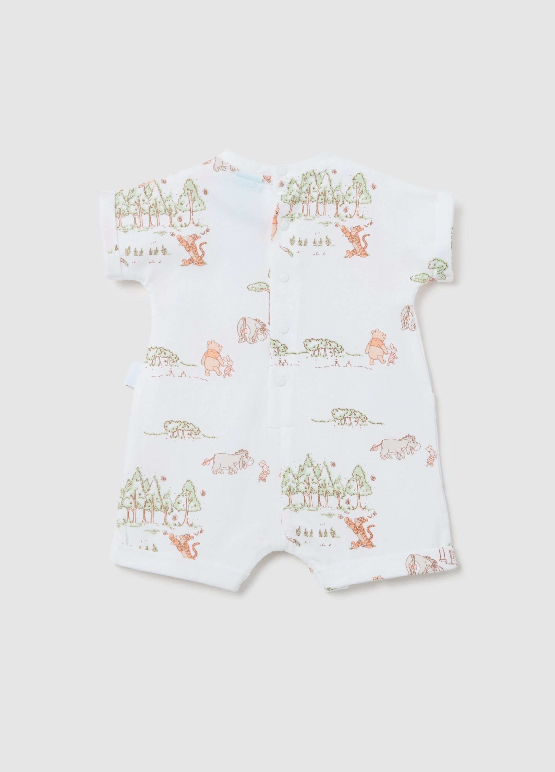 White romper suit in cotton with Winnie the Pooh embroidery and print