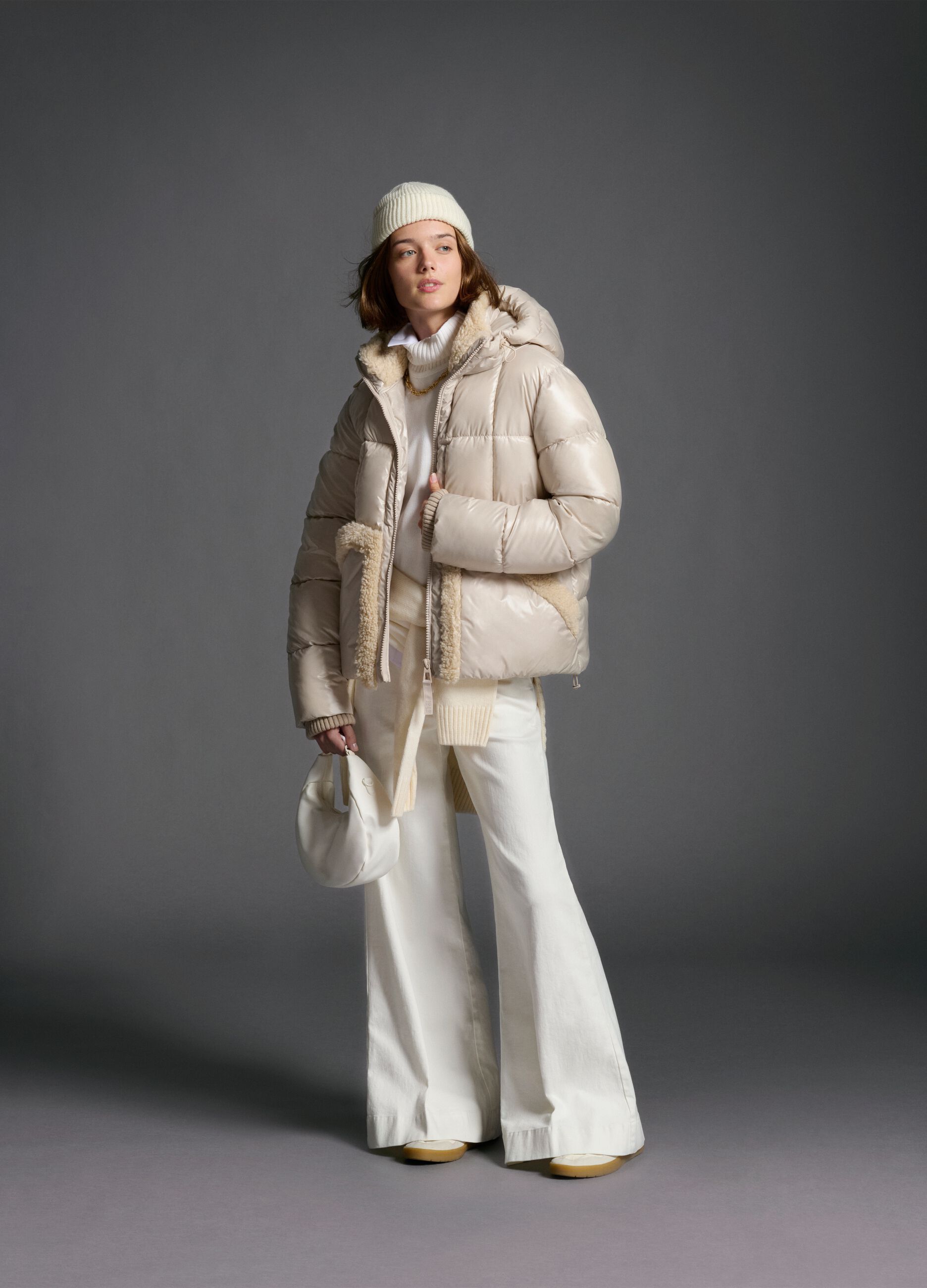 The Iconic Puffer light beige jacket with hood and sherpa details