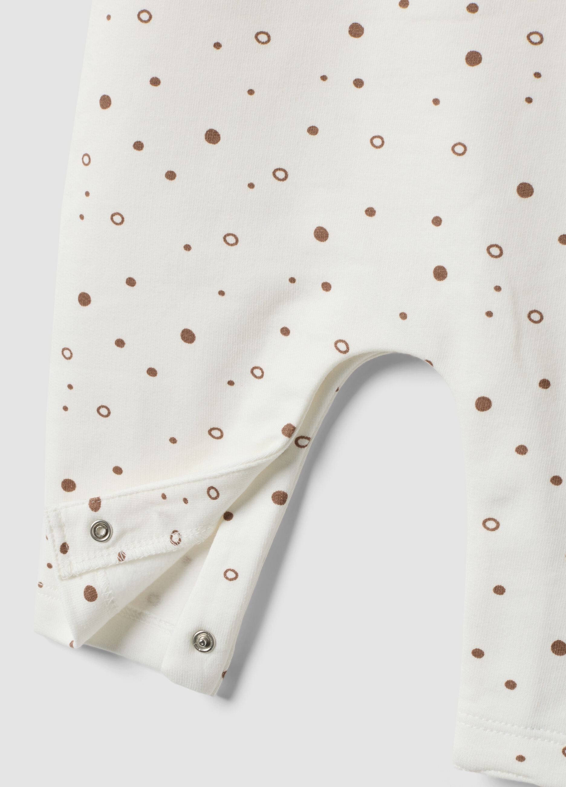 White pure organic cotton polka-dot baby sleepsuit